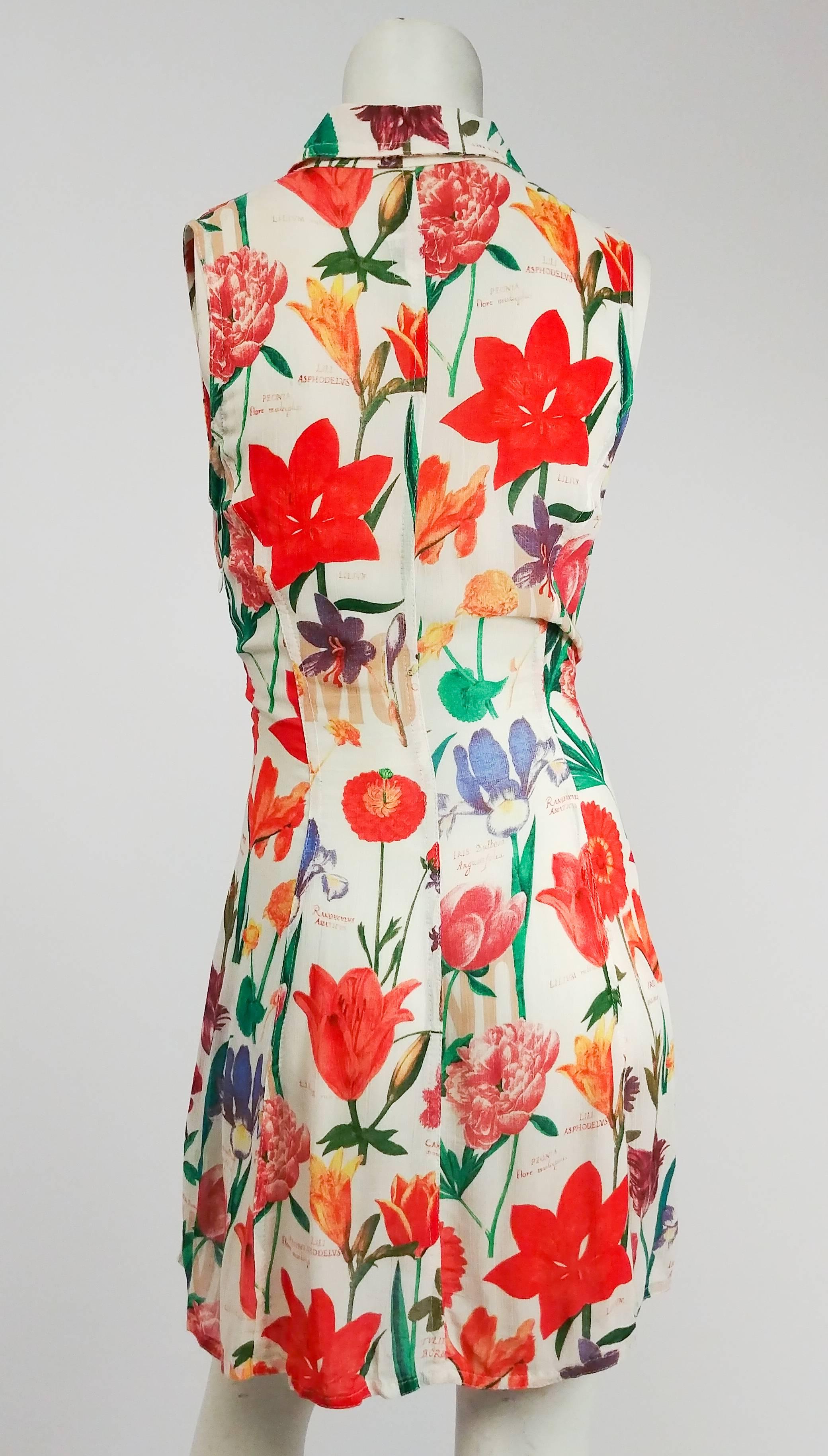 Moschino Floral Printed Tie Front Dress. Button down bodice ties in front to reveal midriff. Elasticated band on skirt. 