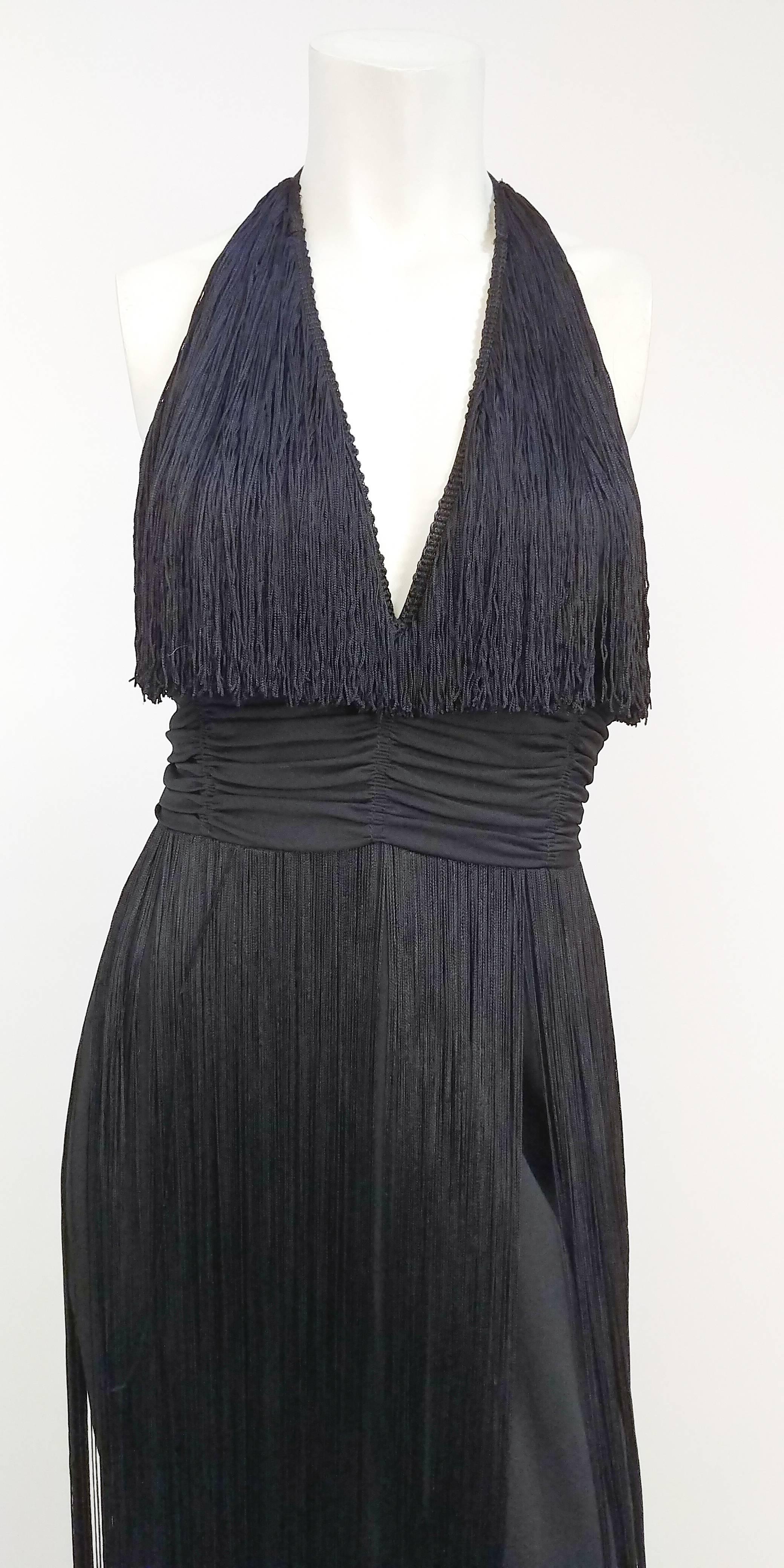 1970s Lilli Diamond Long Fringe Maxi Dress. Halter neckline. Zips up back. Fringed bodice & long fringe skirt over jersey base. 
