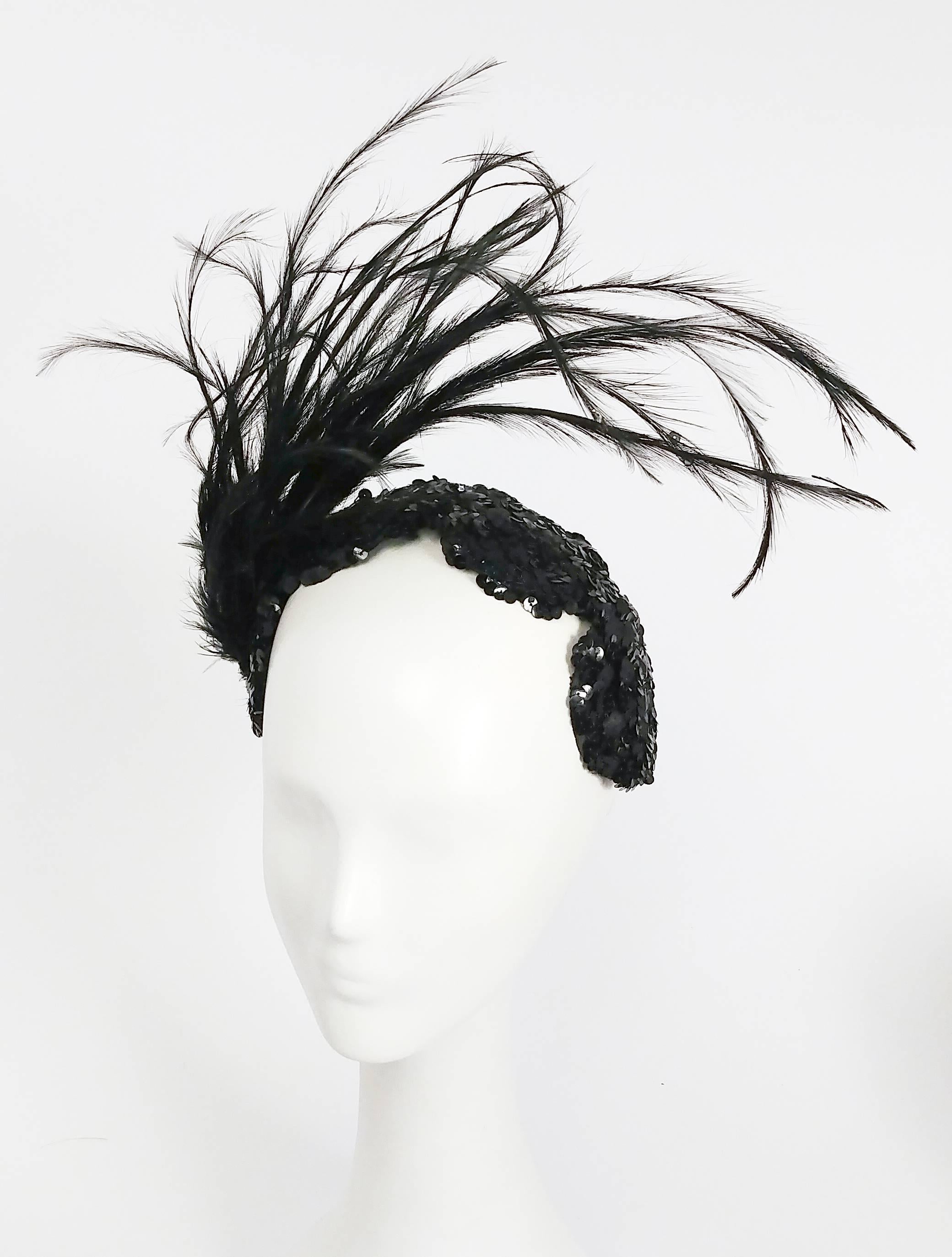 1950s Black Sequin Headband w/ Feathers. Rhinestone embellishment on one side with large statement feathers. Set on a a velvet headband. 
