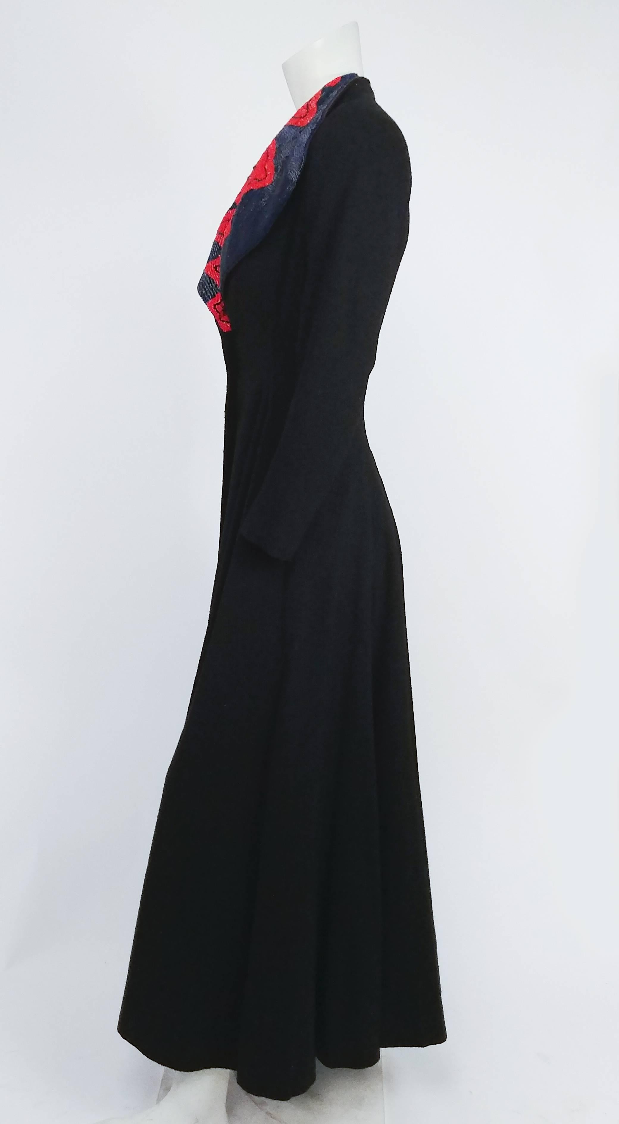 1940s Black Wool Coat w/ Red & Blue Beaded Collar. Gorgeous full length 1940s coat with red & blue large beaded collar. 3 buttons down front. Fitted waist, skirt flares out. Textured black wool.