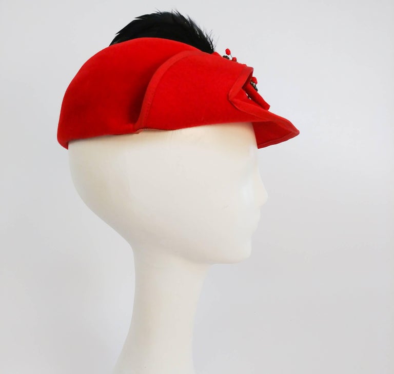 1930s Red Sculptural Velvet Hat with Black Feather For Sale at 1stDibs