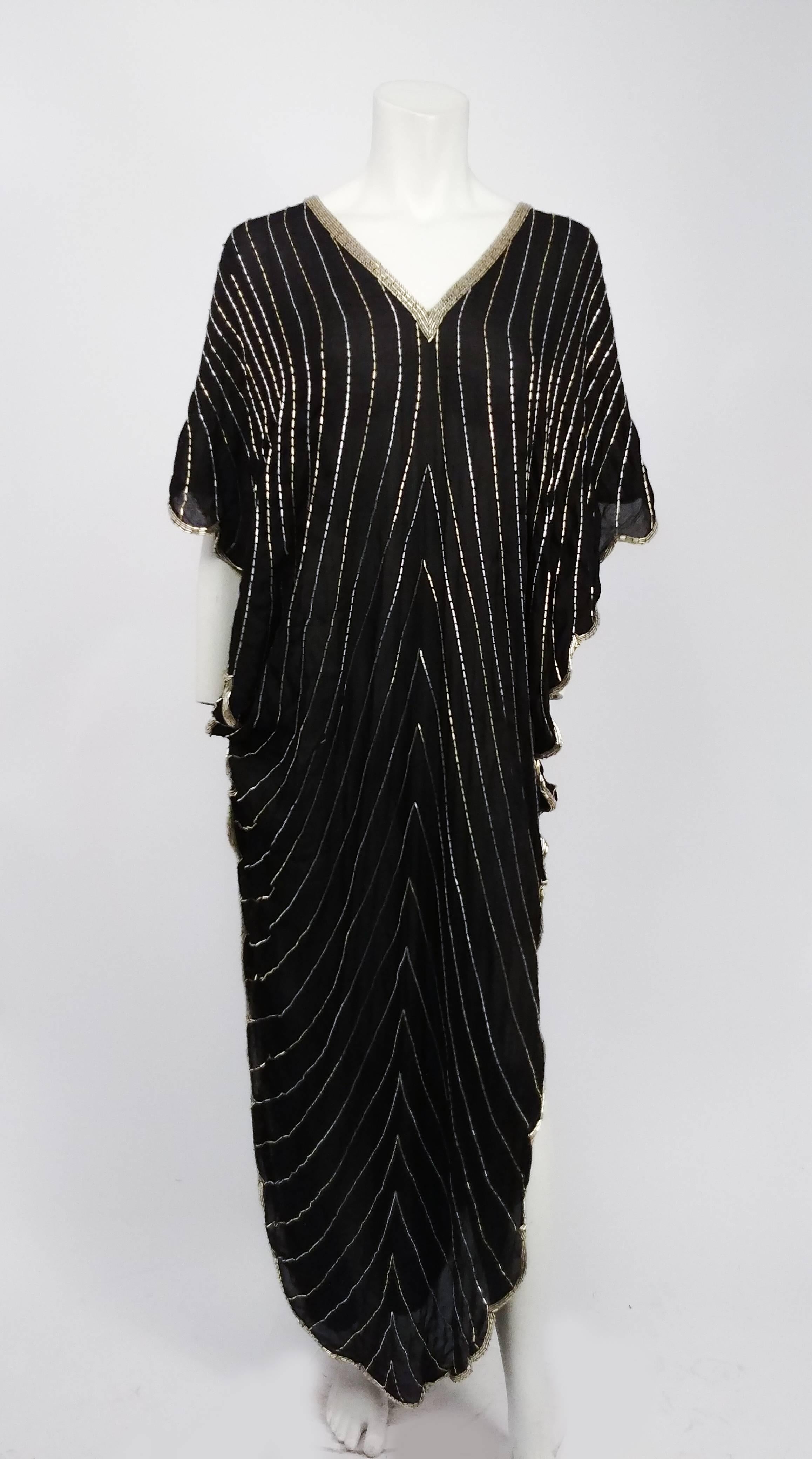 1980s Judith Ann Scalloped Silk Chiffon Silver & Black Caftan. Black silk base with silver beads in a striped pattern, and beaded collar and hem. Scalloped hem design. 