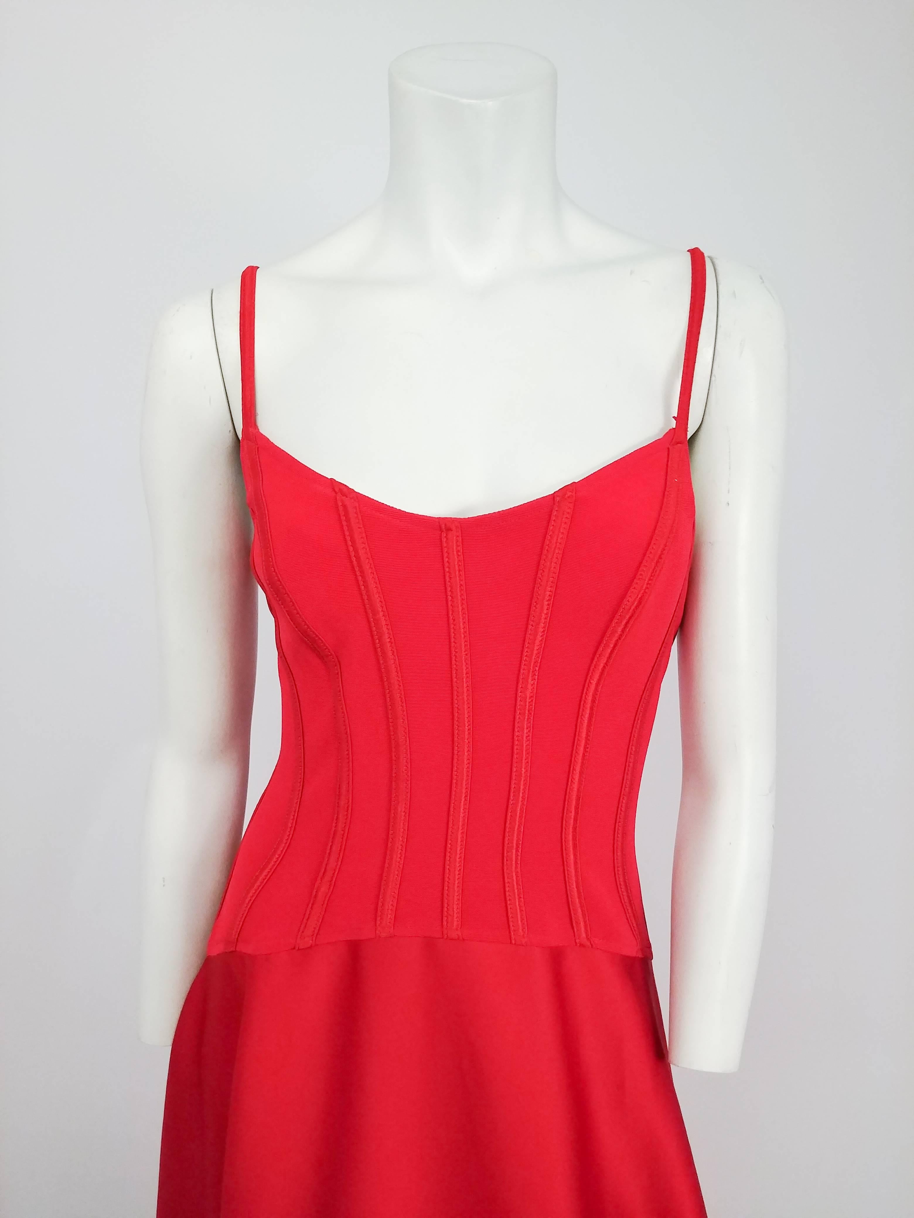 1990s Tadashi Red Corset Top Evening Gown. Stretch jersey top with spaghetti straps. Faux boning topstiched on bodice. Long A-ling flared satin skirt.

Here are the measurements for this dress when it is not stretched at all (there is a bit of
