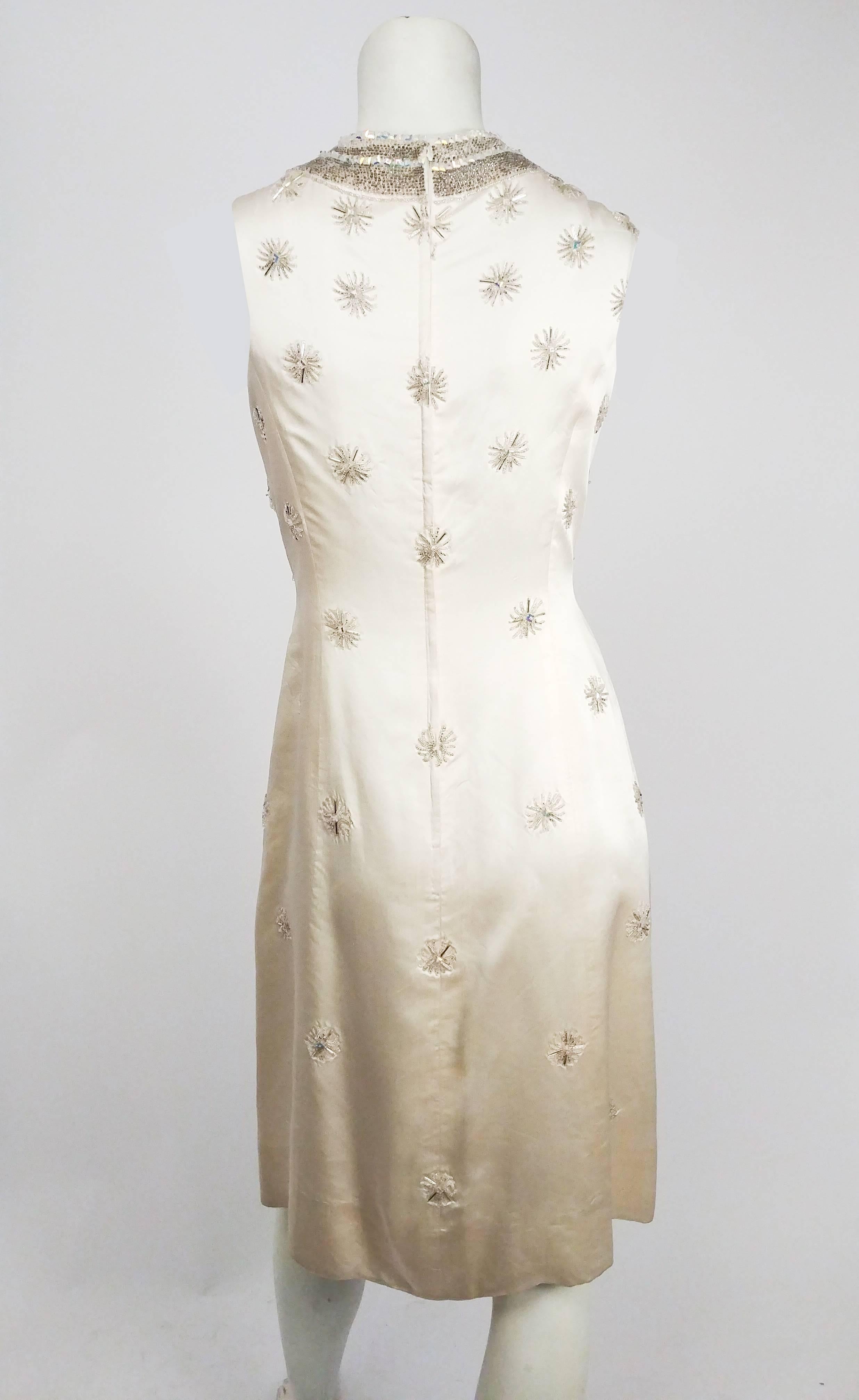 1960s Ivory Silk Beaded Cocktail Dress. Iridescent square sequin collar and starburst designs beaded onto bodice. Ultra buttery silk charmeuse.  