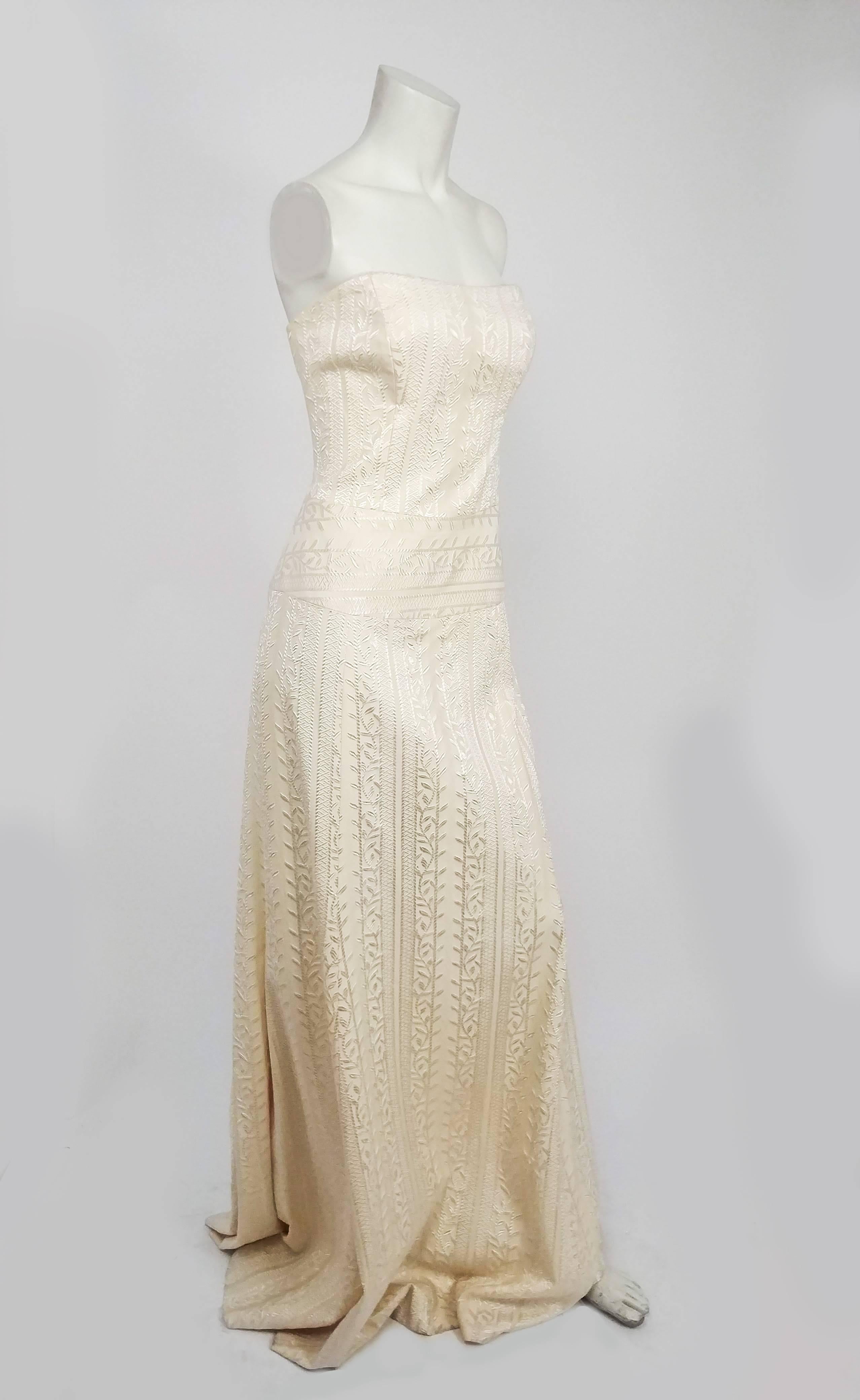 1990s Nicole Miller Strapless Ivory Jacquard Dress. Fitted bodice, foliage pattern woven into fabric. Faux covered buttons up back, side zip closure. Matching shawl with ribbon ties. 