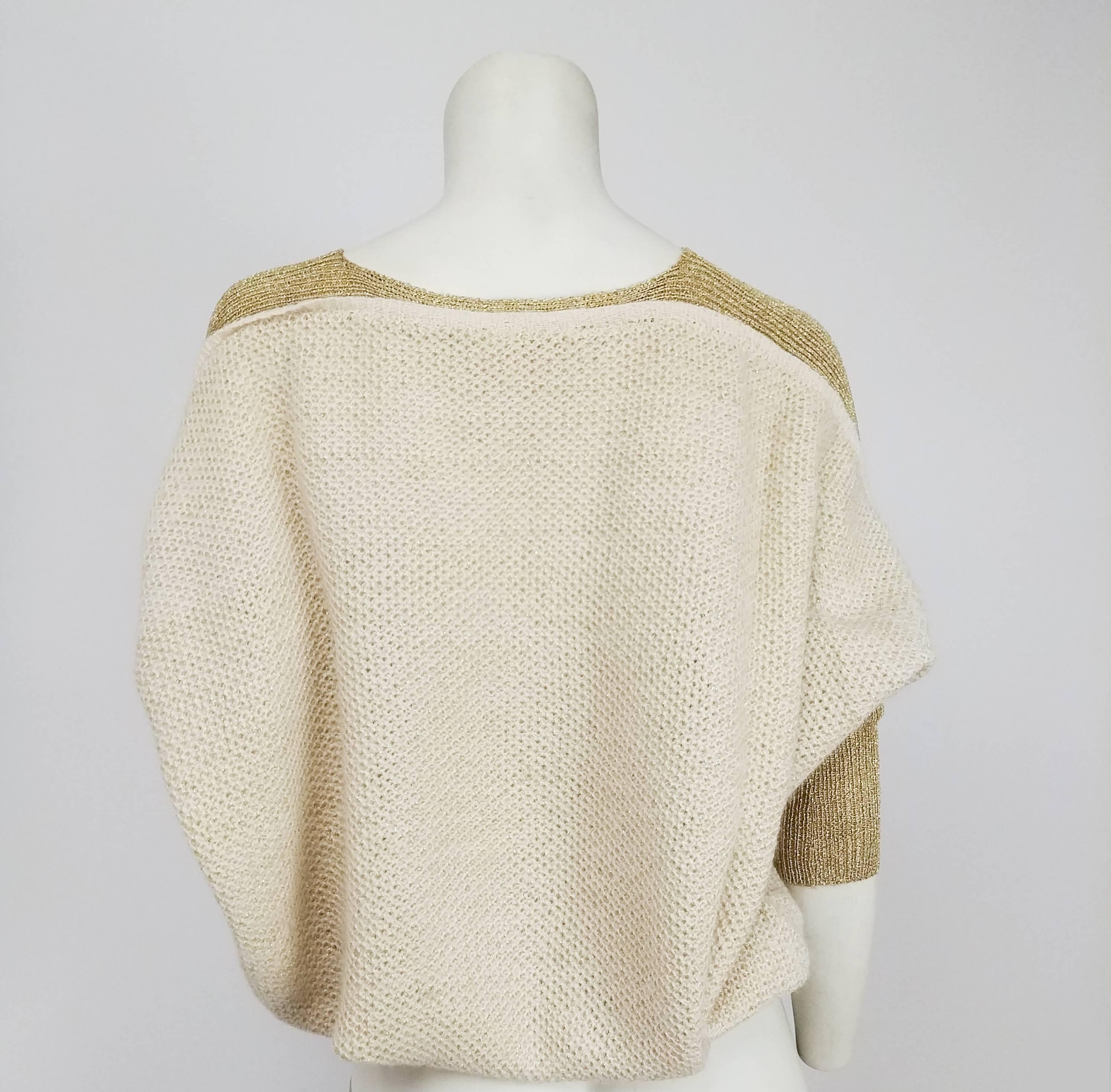 cream and gold sweater