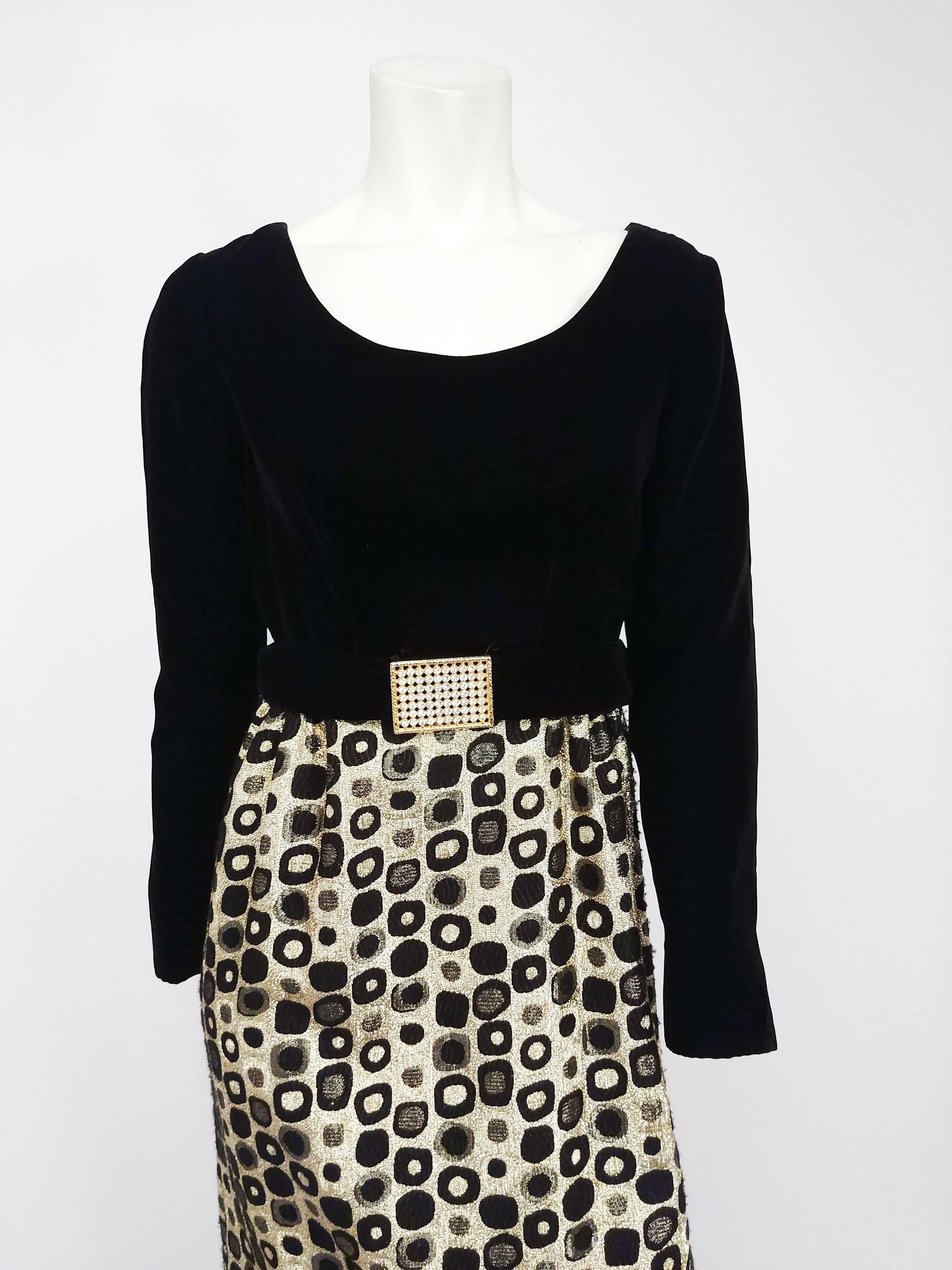 1960s Metallic Gold Brocade & Black Velvet Maxi Dress. Geometric circular pattern woven into fabric of skirt. Faux belt hooks at back, rhinestone encrusted belt buckle.