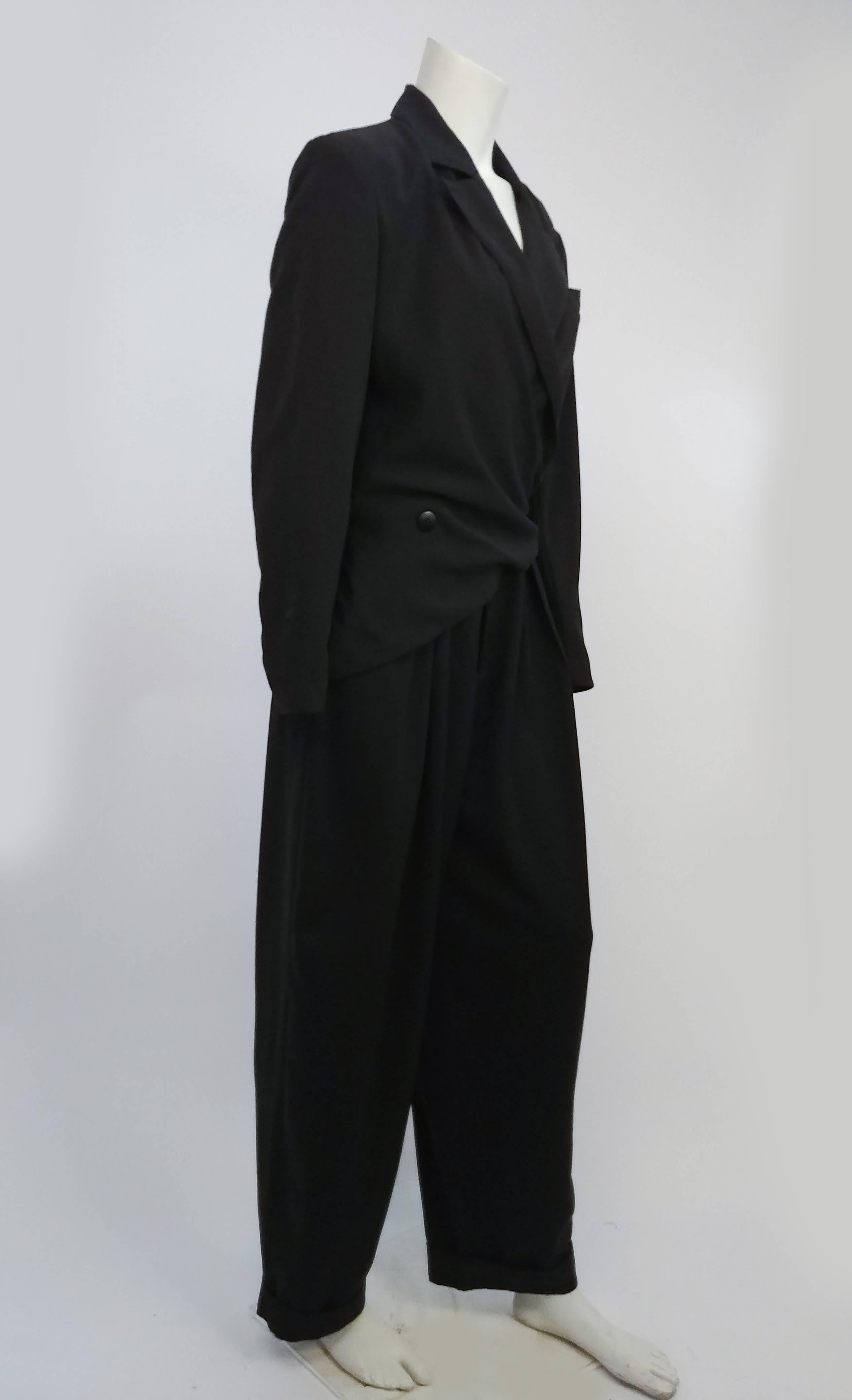 1980s Tuxedo Jumpsuit. Fullbody menswear-like jumpsuit, draped closure that buttons on side conceals zip on pants. 