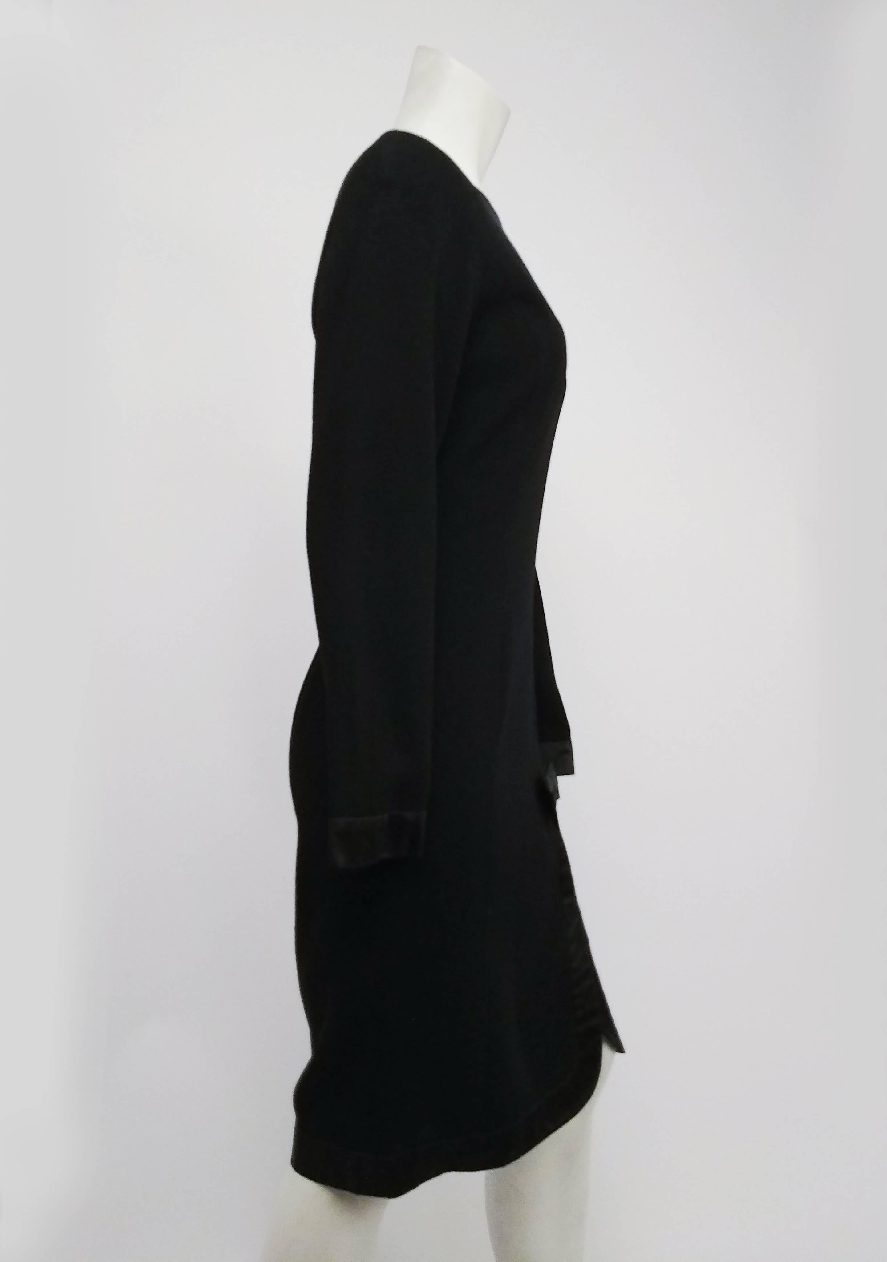 1980s Valetino Missy Black Cocktail Dress w/ Satin Trim. Organza peek-a-boo bib collar. Satin bow decorates trim at mid-thigh. 