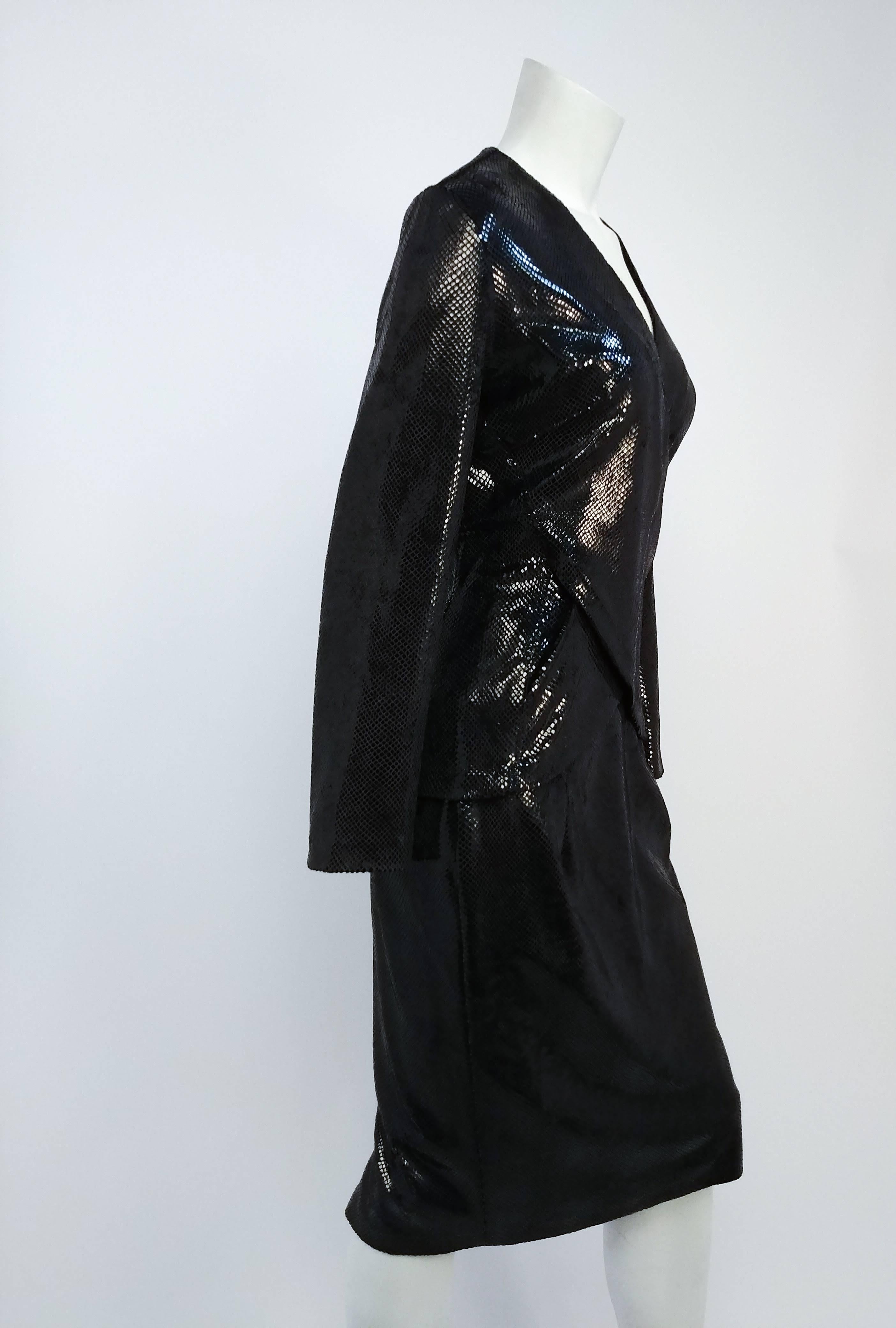 1980s Glossy Faux Snakeskin Black Skirt Suit Set. Draped crossover wrap top, side zip closure. Some stretch in fabric. Black pencil skirt. 