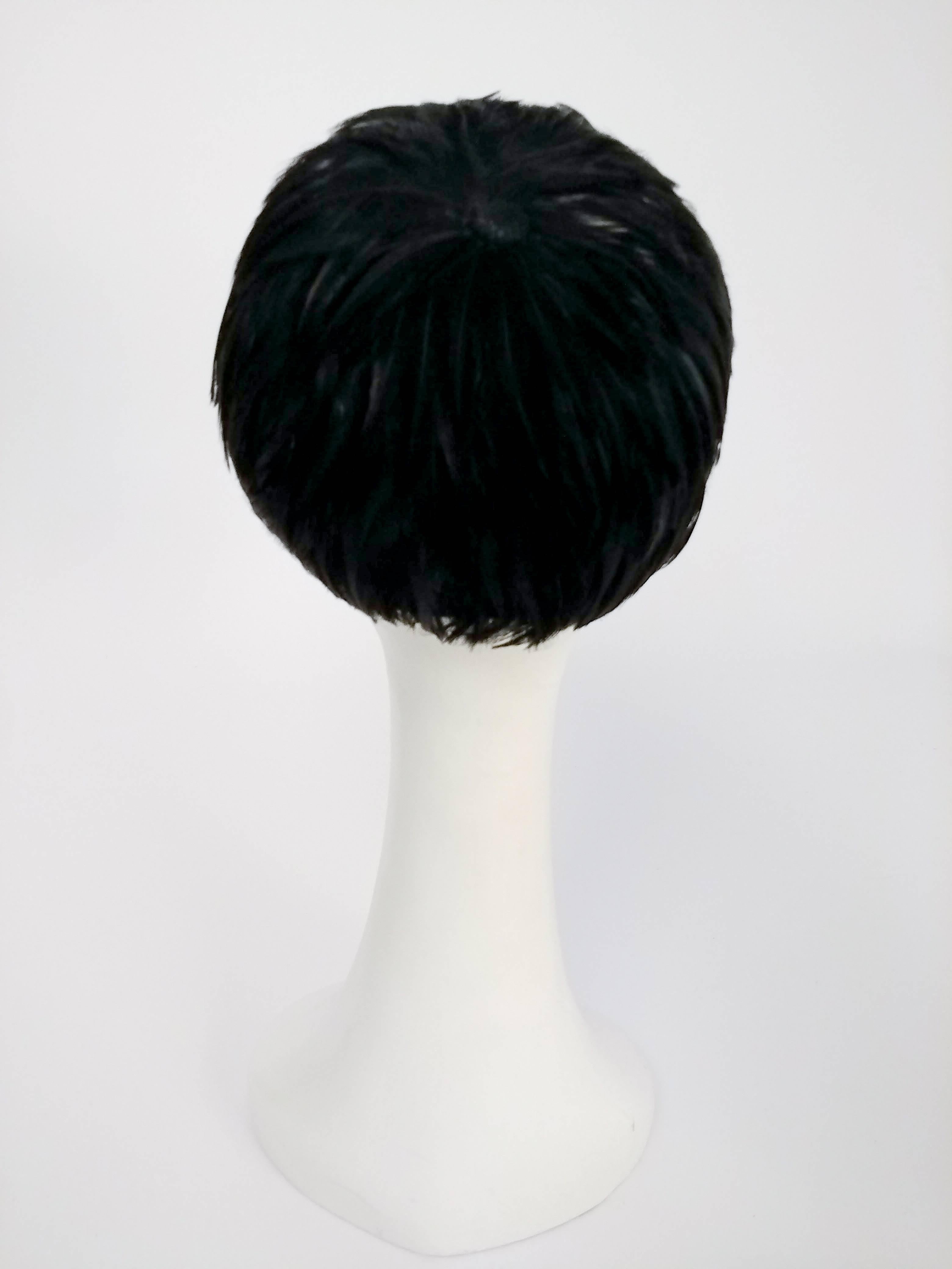 black feathered hat