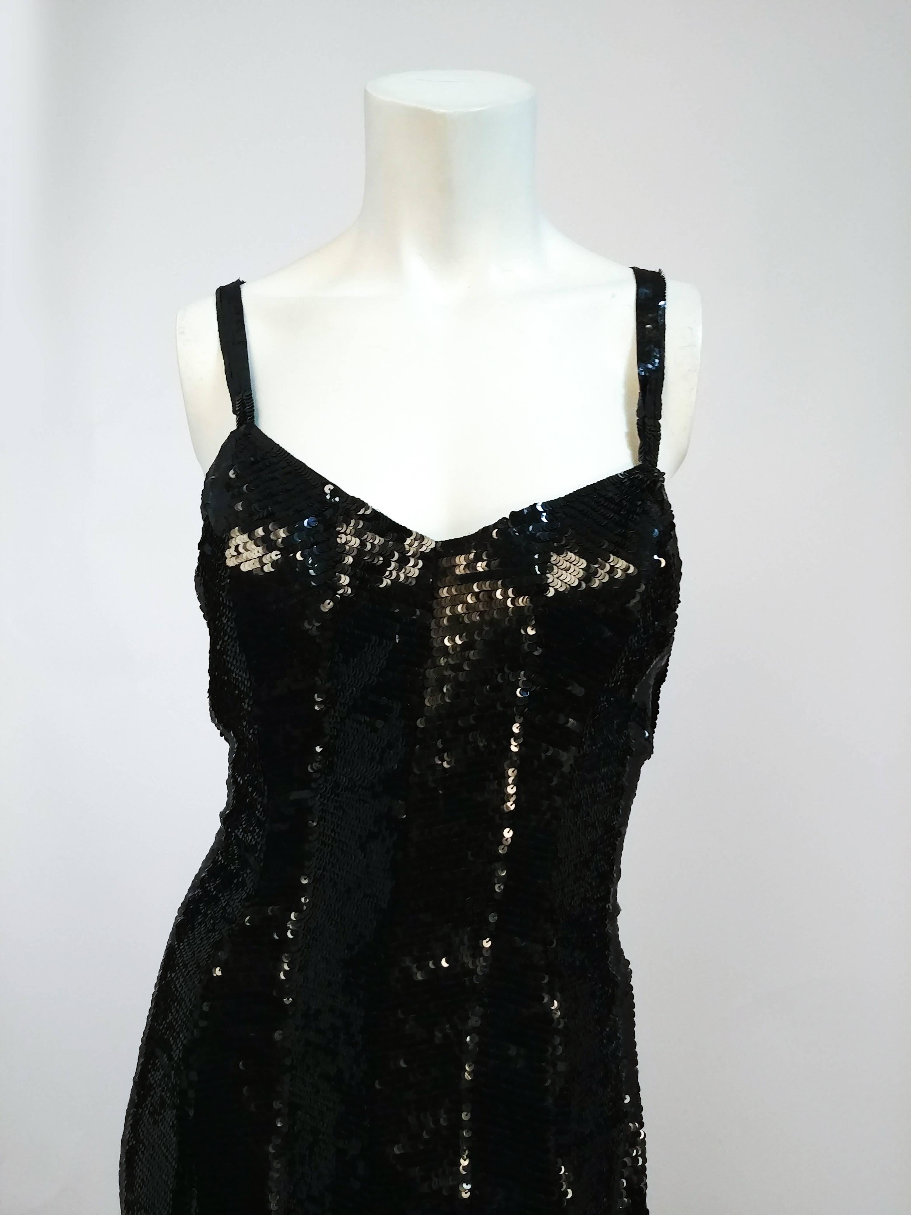 1990s Ralph Lauren Black Sequin Gown. Purple label. Plunging low back with crossed straps. All-over sequins with a slight striped pattern. 