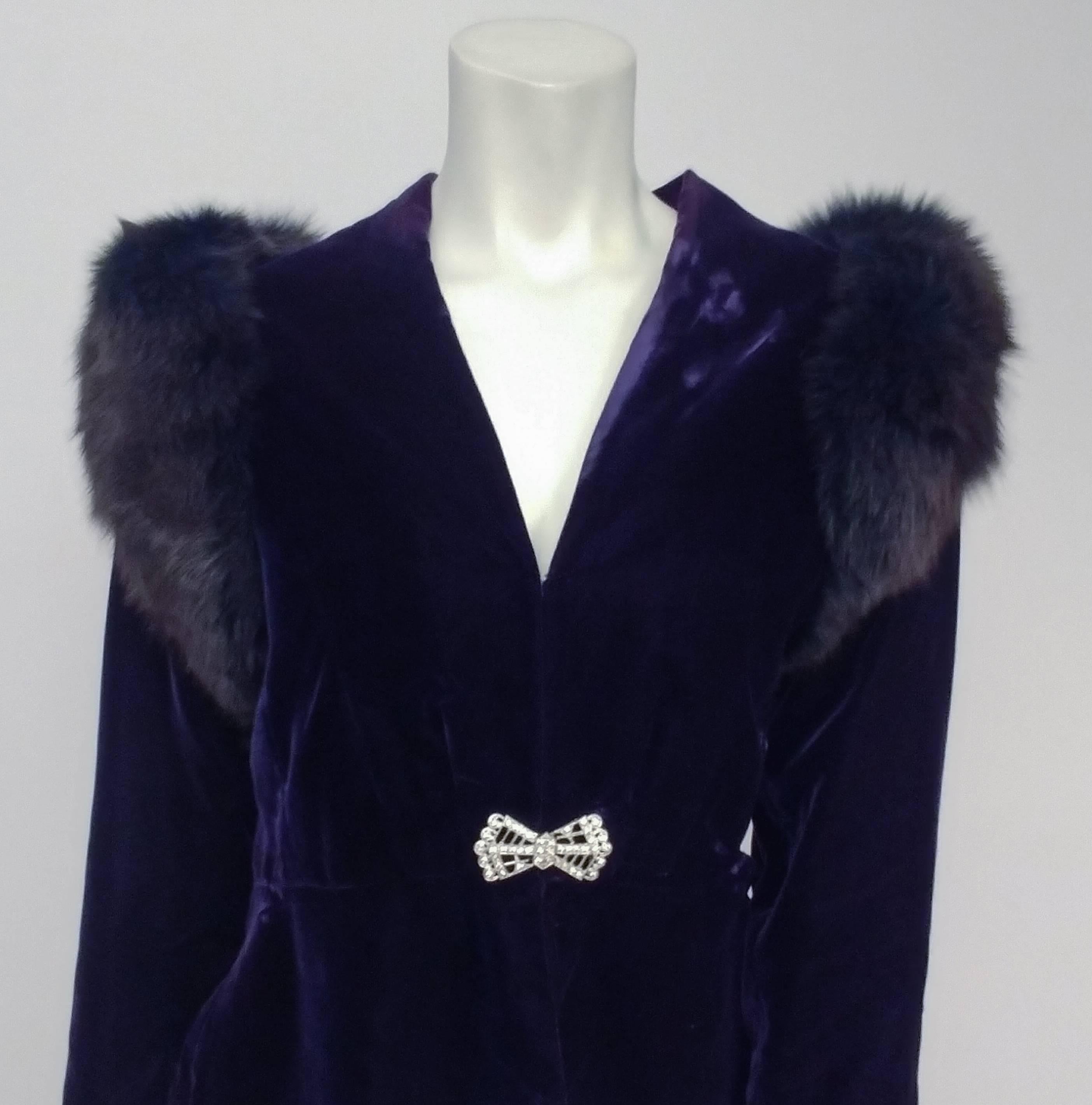 1980s Victor Costa Fox Trim Blue Velvet Jacket. Hooks closed with rhinestone clasp at waist, and can be hooked closed with additional hook and eyes higher up the front. Dyed blue fox trim at shoulders. 