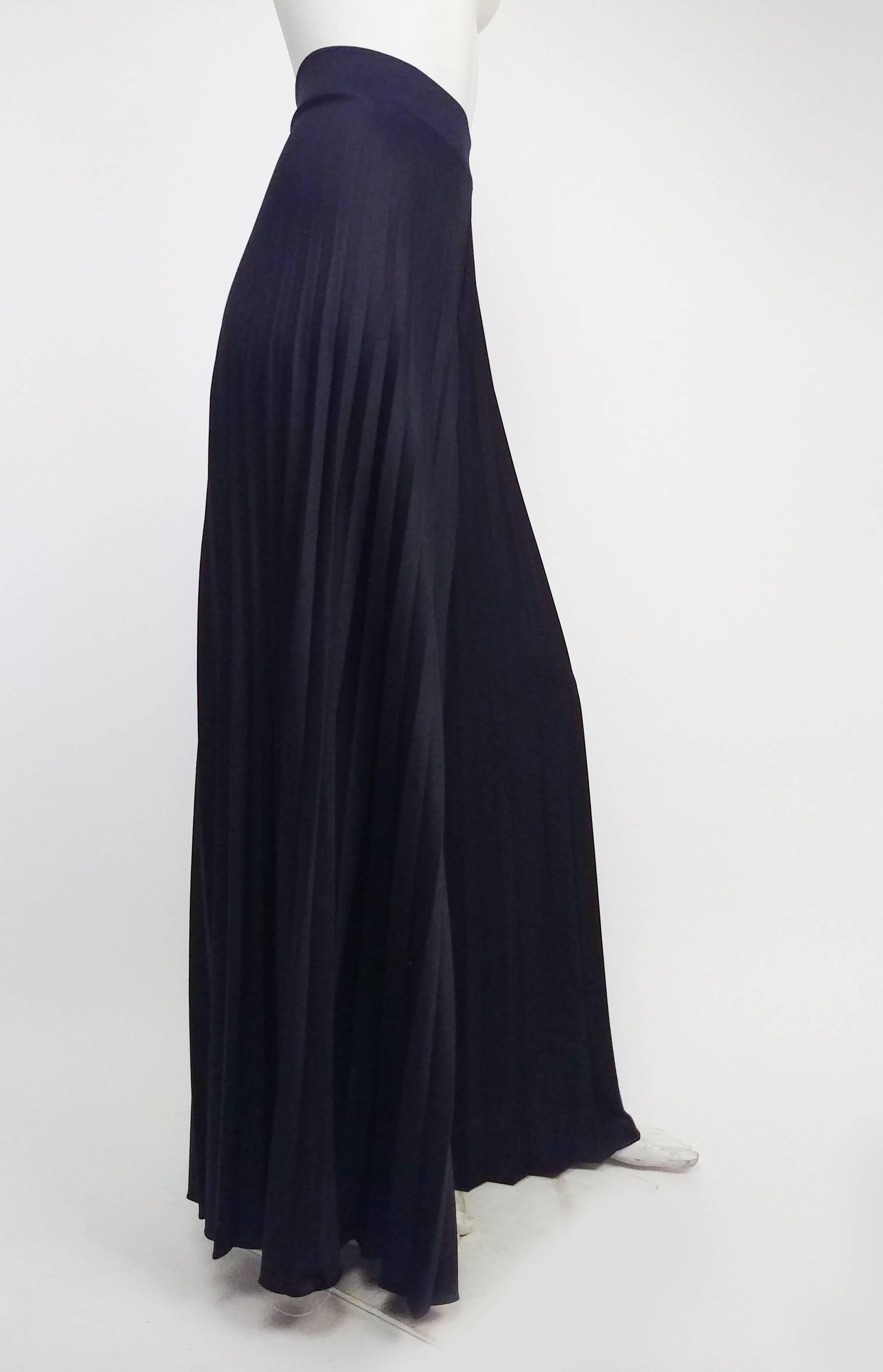 1970s Black Pleated Wide Leg Pants. Elasticated waist. Set pleats created dramatic flare when walking or dancing. 