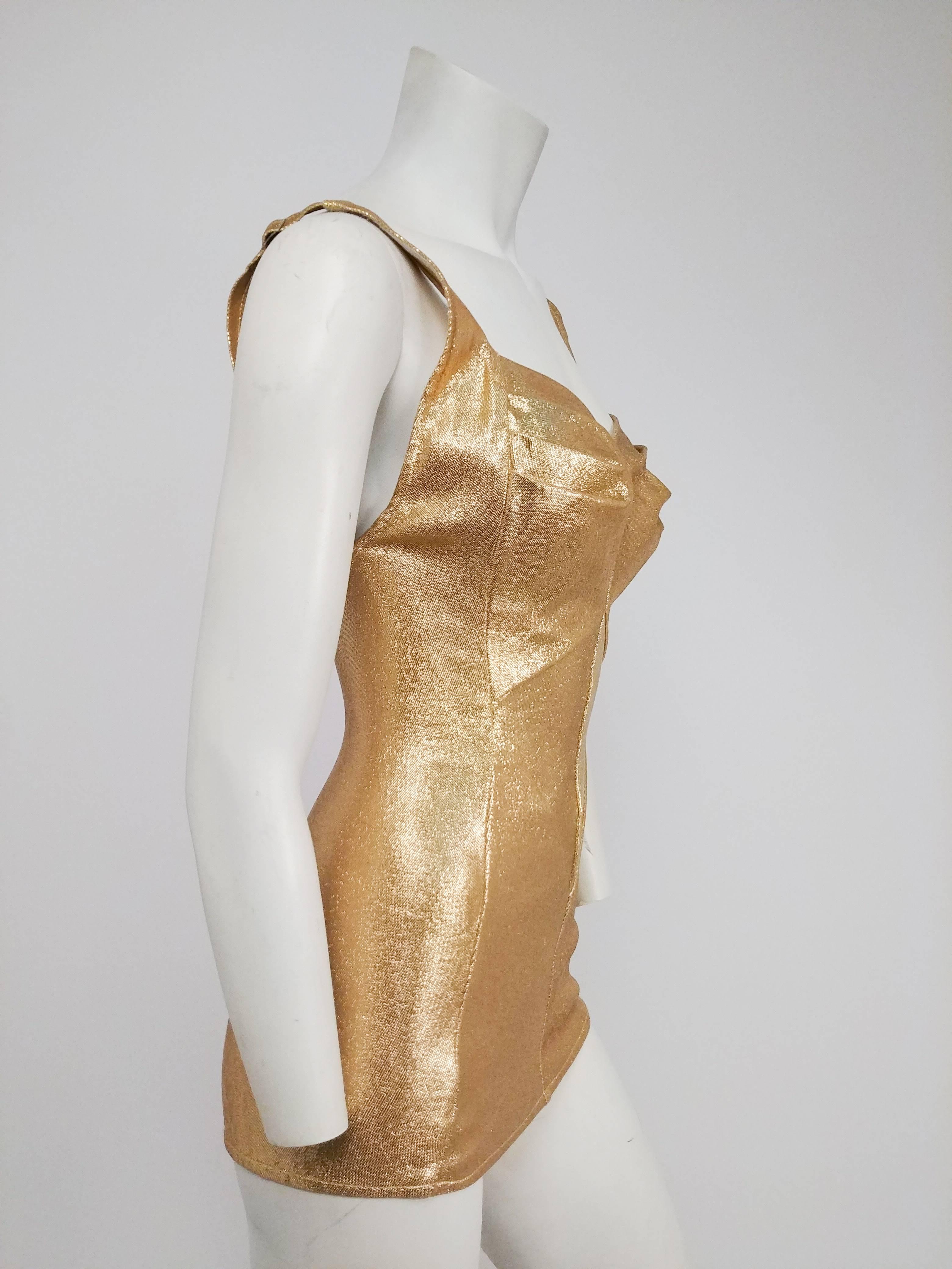 1950s Cole of California Gold Lamé Bathing Suit. Breathtaking gold vintage swimsuit with diamond inserts, very reminiscent of vintage lingerie! Plunging low back and adjustable straps. Zips up back. 