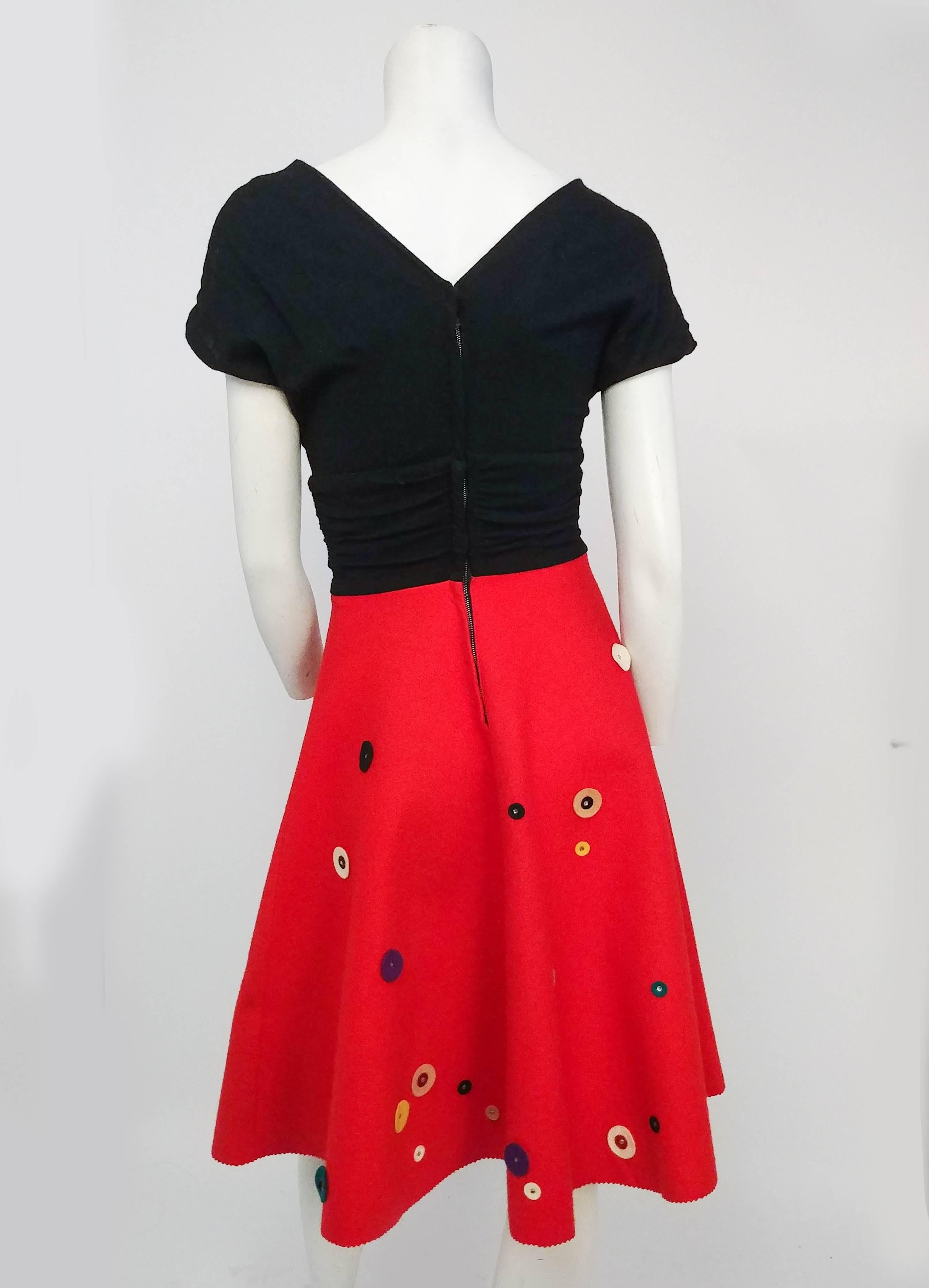 1950s A-Line Red & Black Novelty Dress. Full red felt skirt with adorable felt multicolored circles and rhinestones. Black draped bodice. 