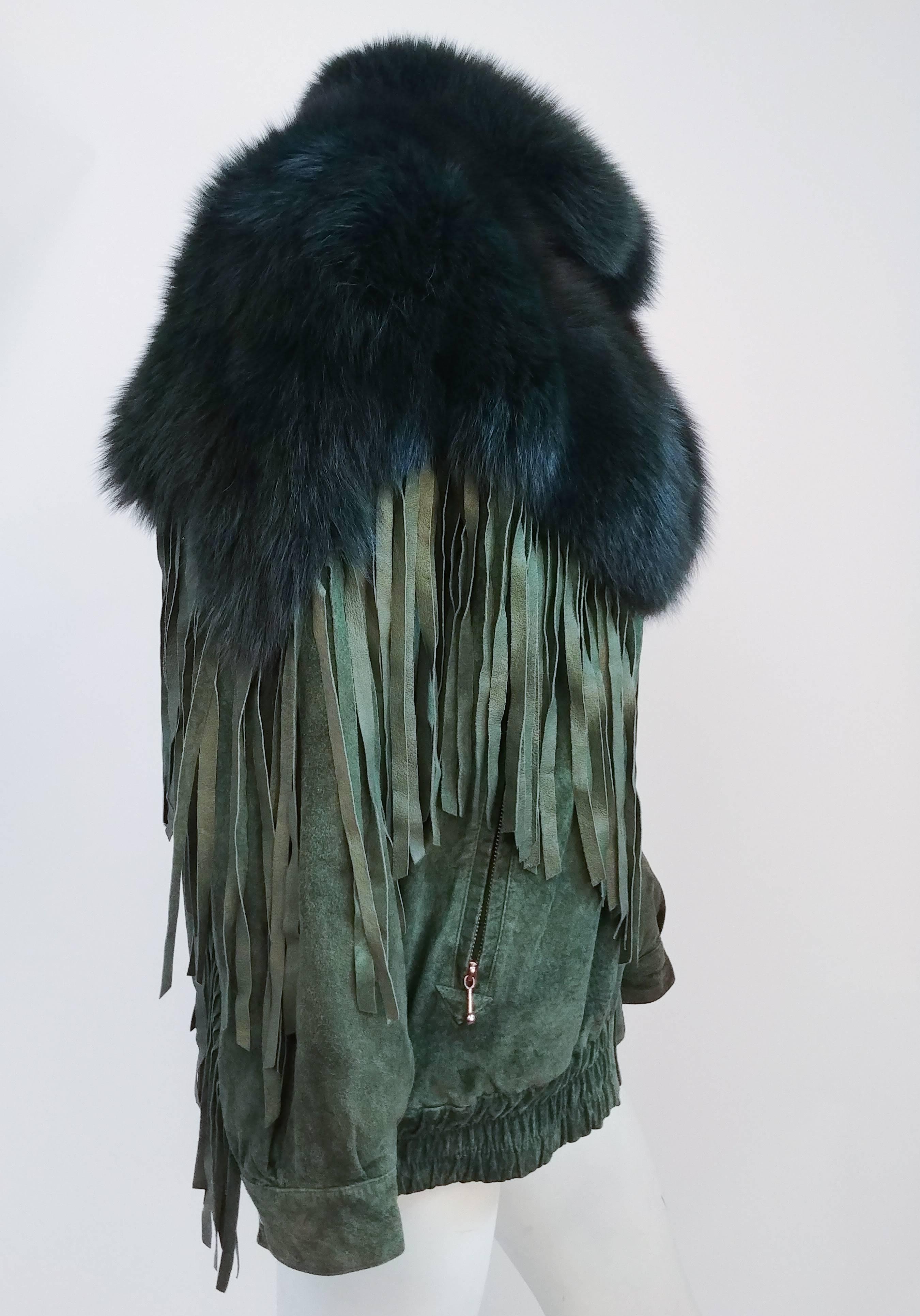 1980s Green Fox Fur Trim Suede Jacket w/ Fringe. Emerald green suede jacket with fringe and emerald fox fur. Front zipper closure and elasticated waist