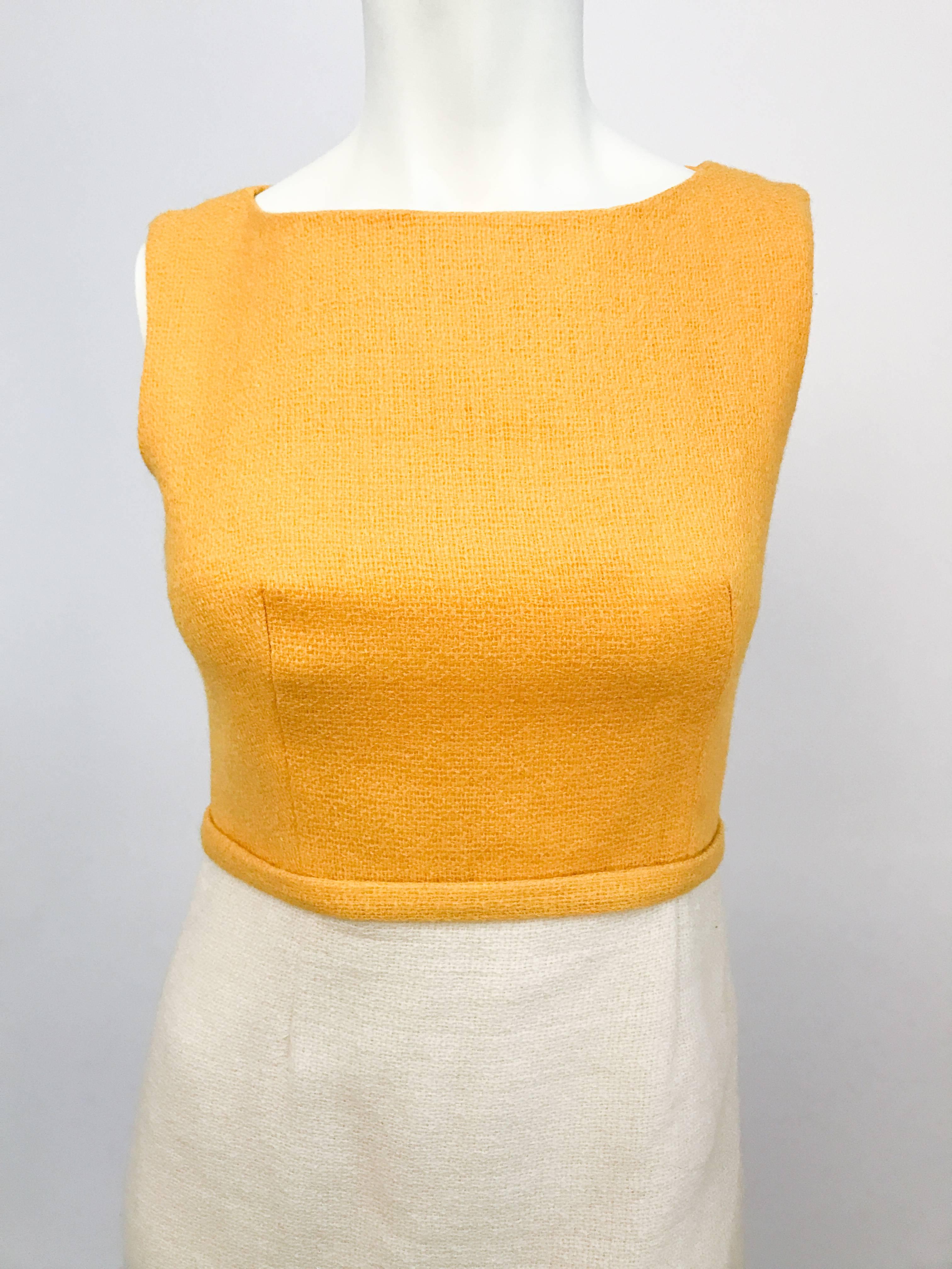 1960s Lanz Mod Daisy Dress. Mod yellow and beige tweed sleeveless dress with daisy embroidery along the hem.