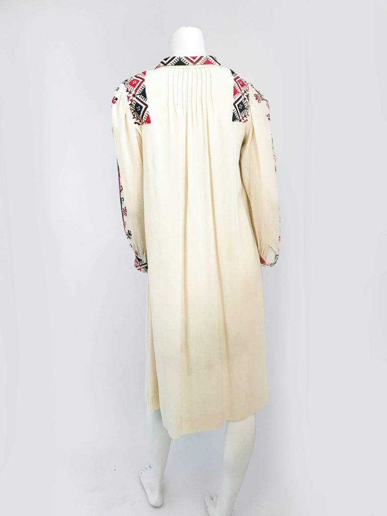 1920s Bohemian Cream Handmade dress. Cream handmade linen dress with black/red hand cross stitch embroidery on collar sleeves, shoulder, and cuffs.