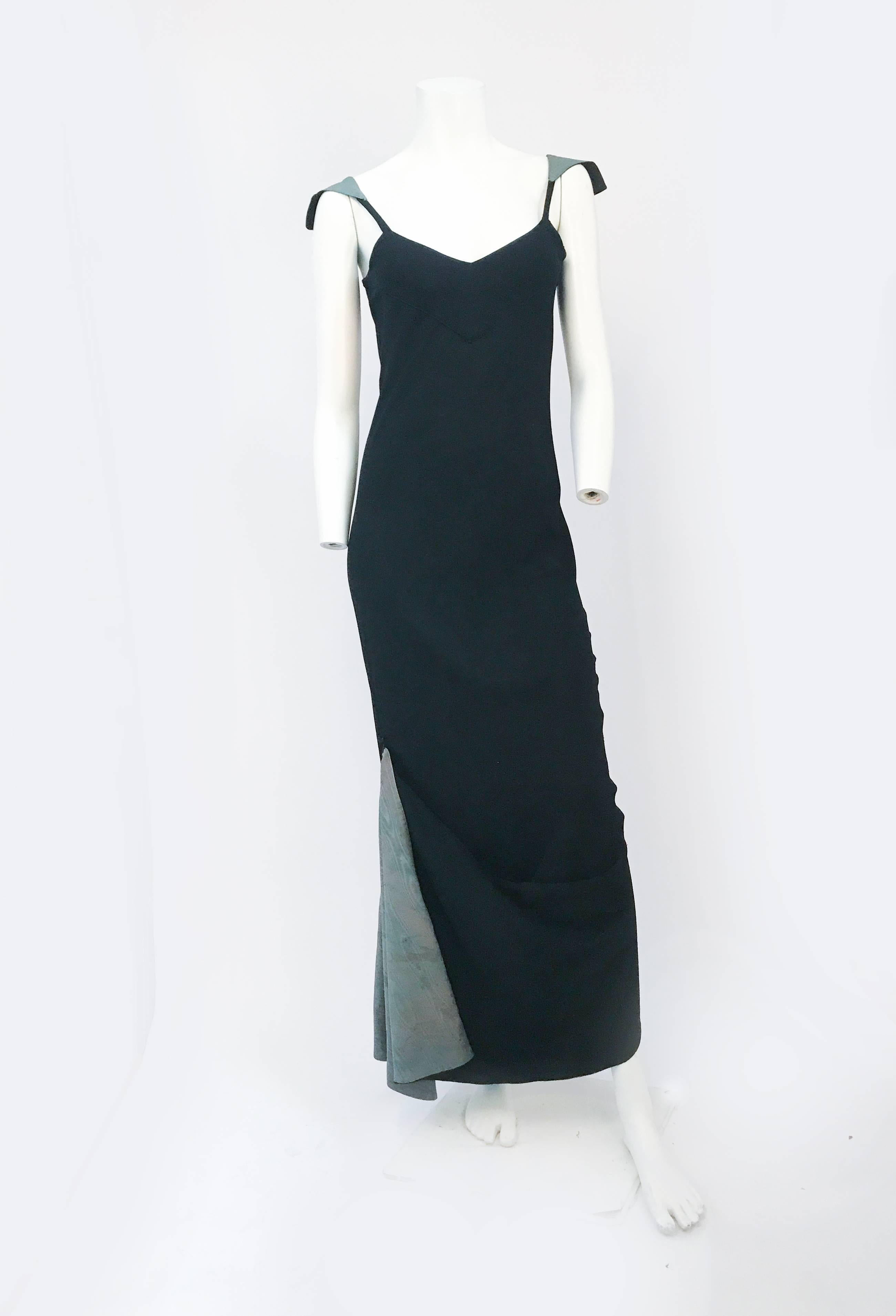 1930s Black Bias Cut Crepe Dress With Green moire Details. Black custom made bias cut crepe dress with mermaid fishtail train lined with green moire. Green Moire shoulder straps. Moire button and loop to secure train while dancing.
