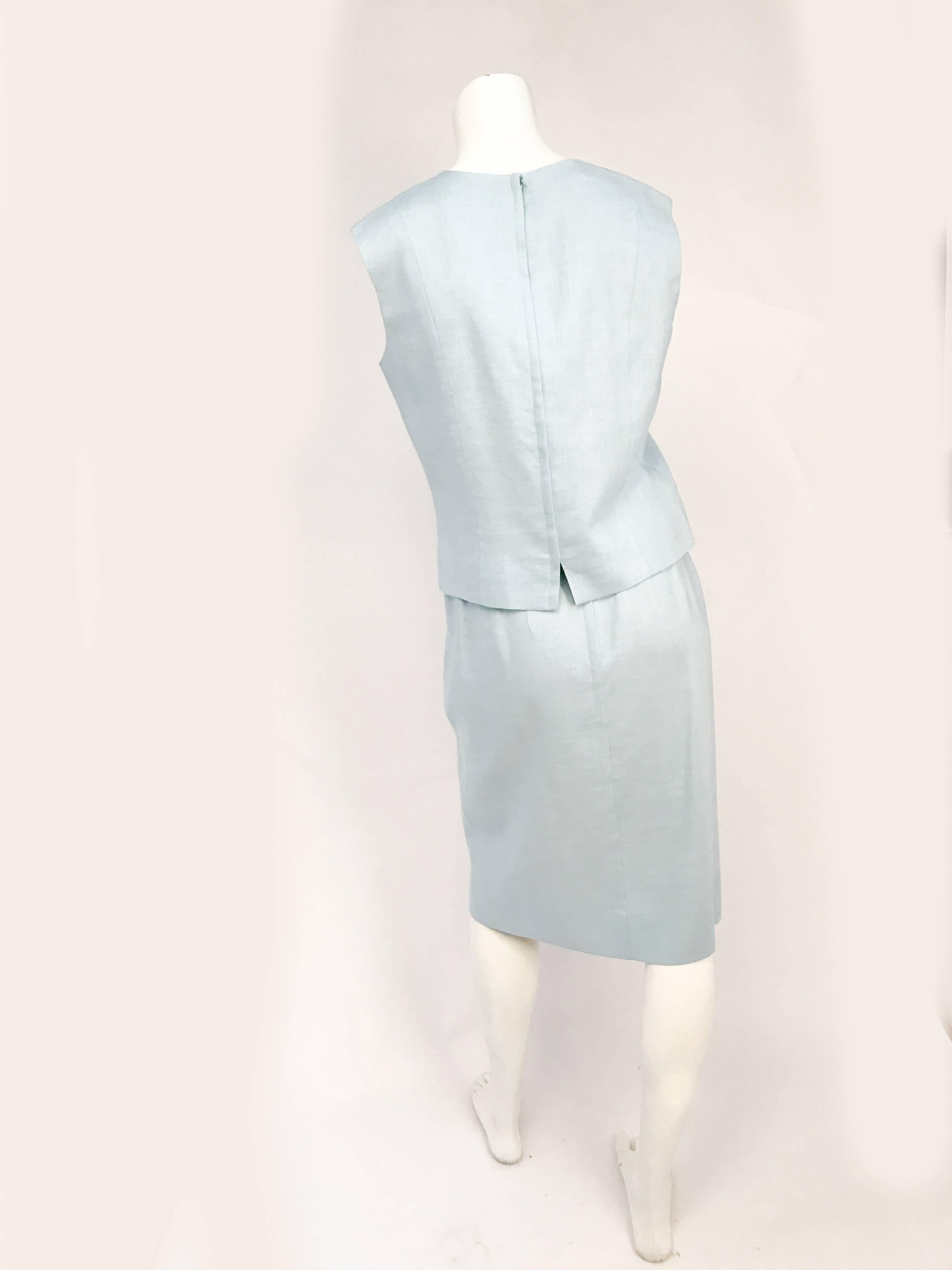1960s Light Blue Linen Skirt/Top Set. Light blue linen skirt/ sleeveless top set with hand-covered buttons along the neckline and center-front.  