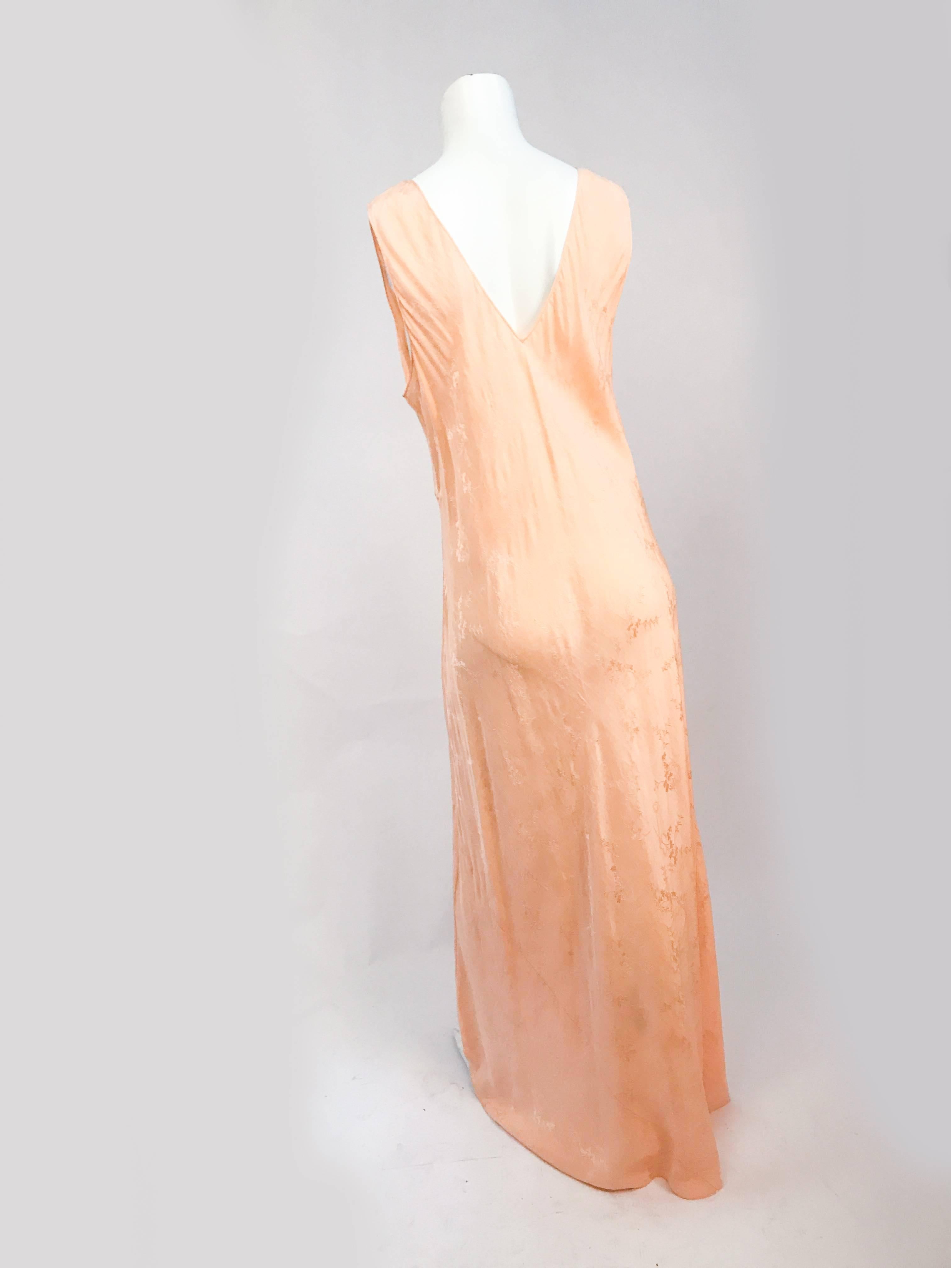 1930s Coral Jacquard Silk Bias Cut Slip Dress. Coral jacquard silk slip dress with embroidery, pulling accents, pin pleats and bias cut fitting.