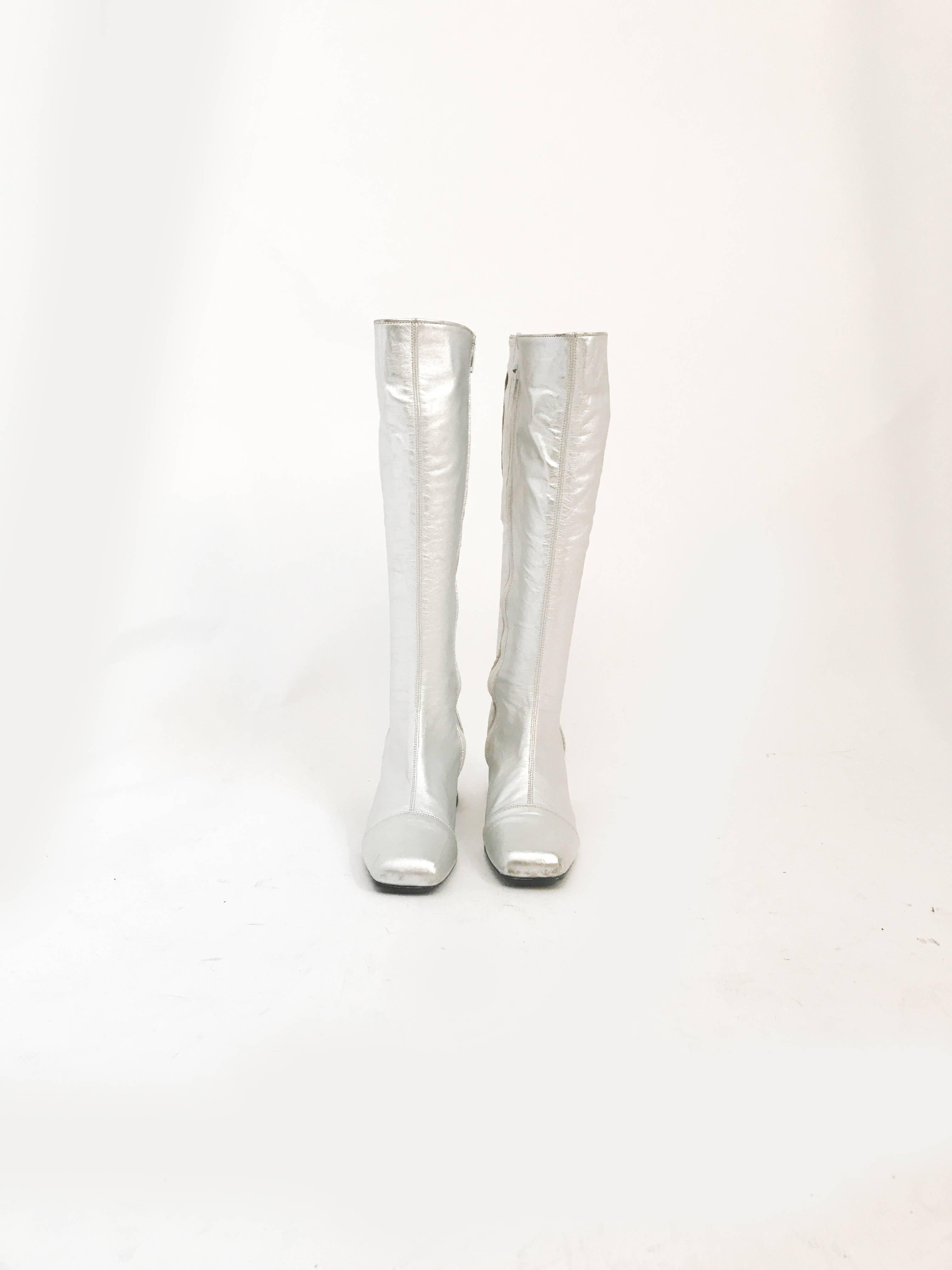 Late 1960s Silver Leather Go Go Boots. Silver leather go go boots with chunky heel and strong elastic at the calf. Barley worn.