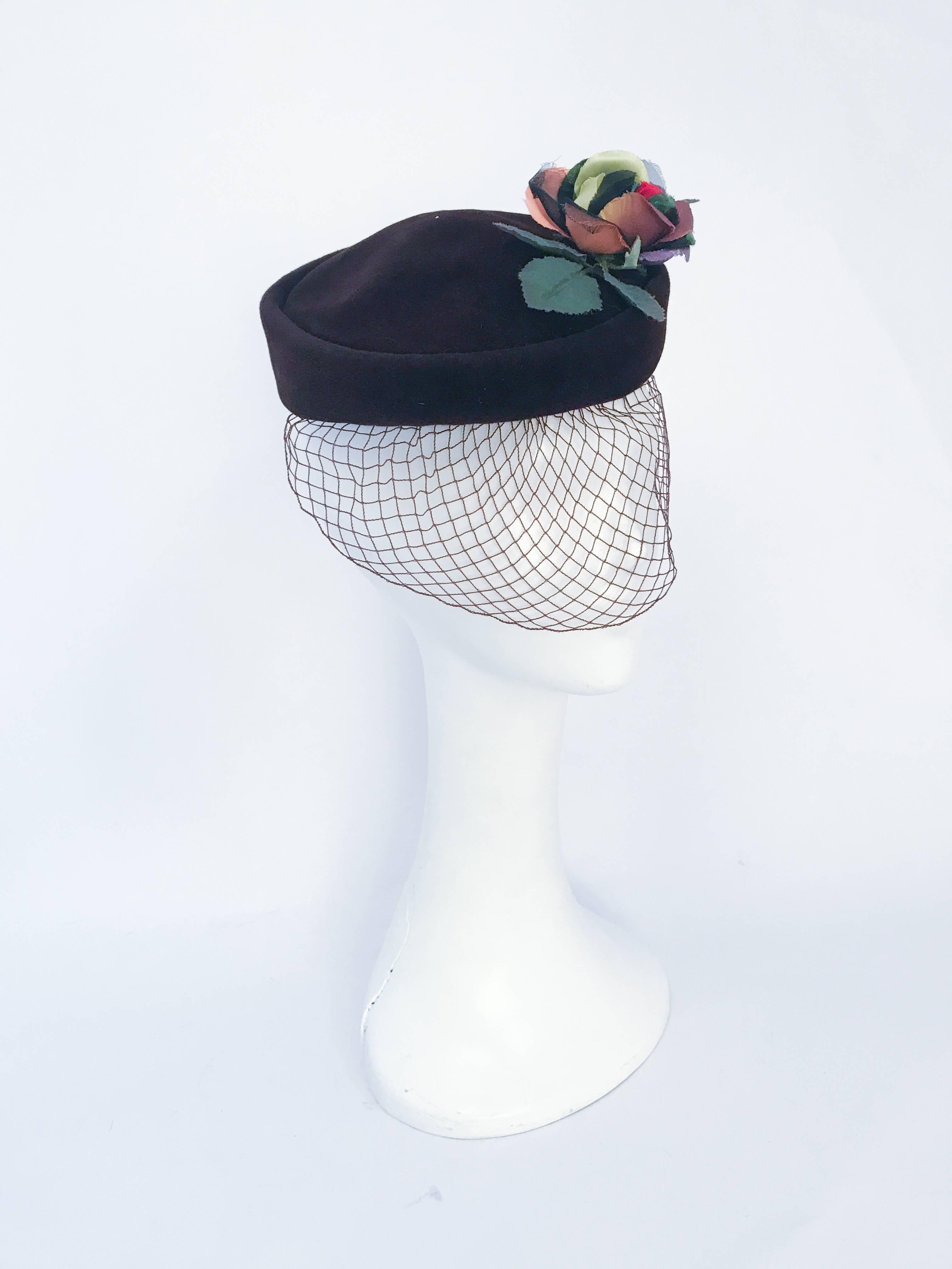 1950s Brown Velvet Cocktail hat with Multicolored Rose. Brown velvet hat with matching brown net and multicolored handmade silk rose and leave detailing.