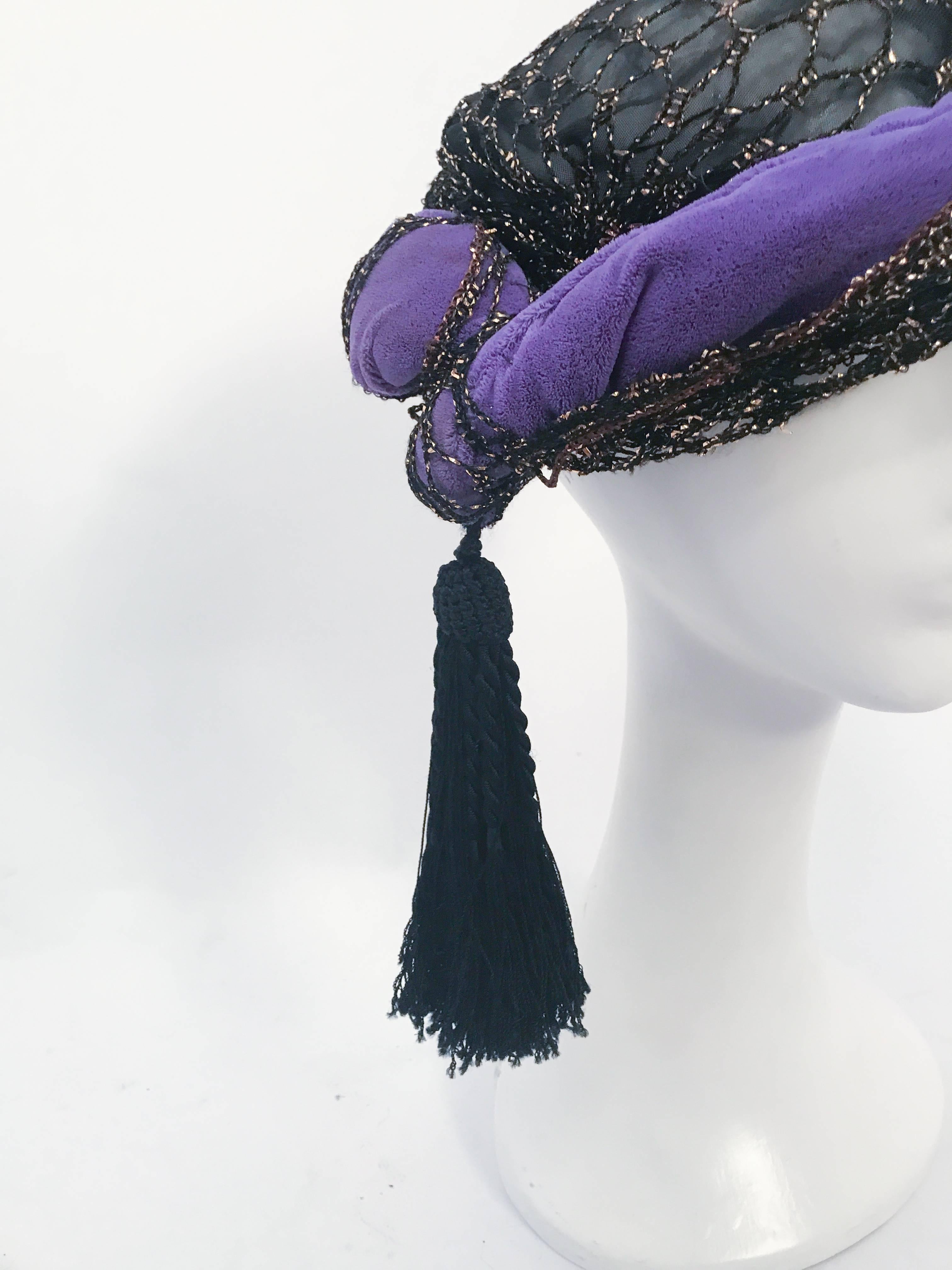 1940s Irina Roublon Purple and Black Velvet Turban. Turban with gold metallic and silk thread netting covering the purple velvet. Handmade silk tassel m