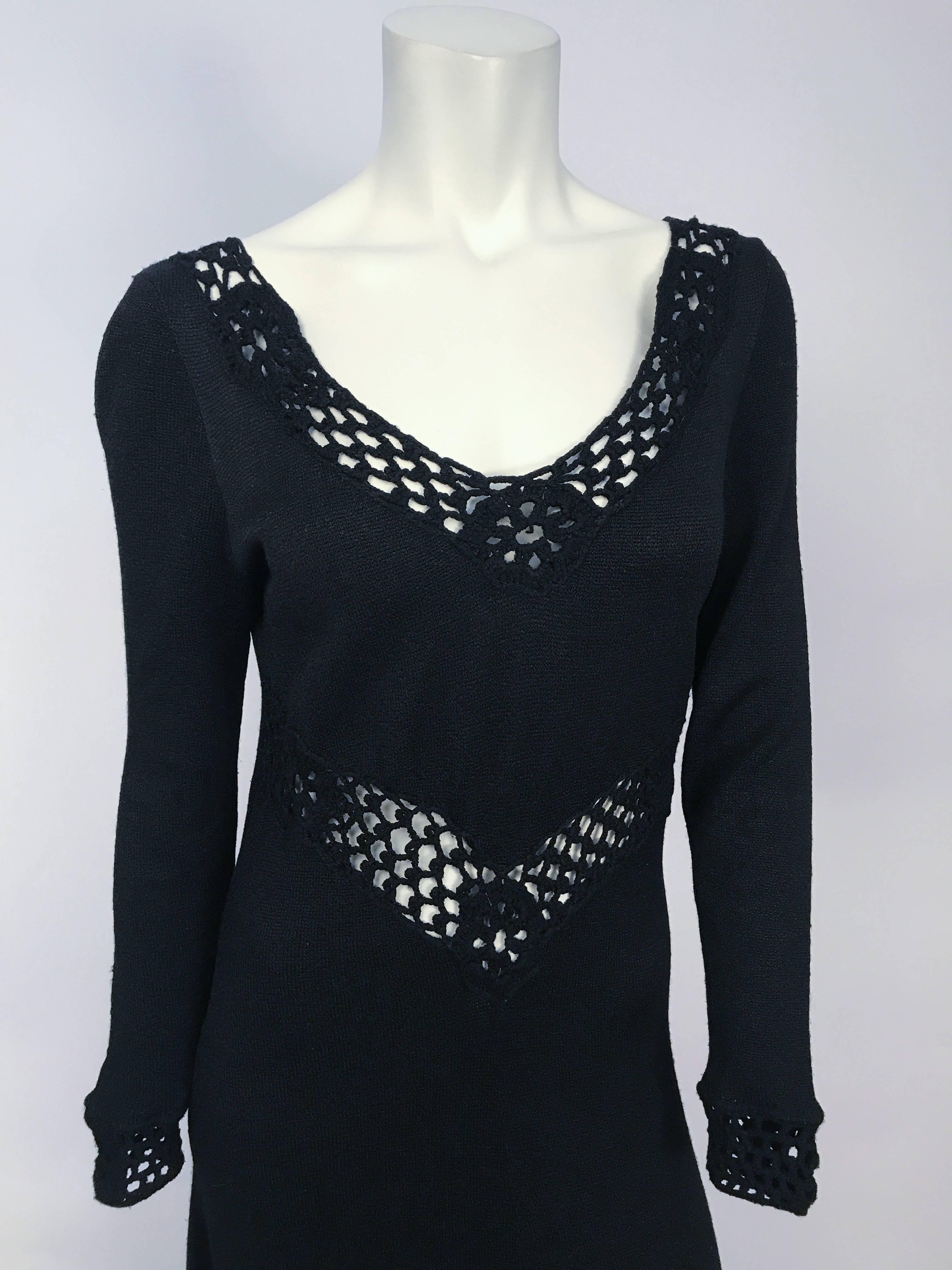 1970s Black Knit and Crochet Full Length Dress. Black full length knit dress with crochet cuffs, neckline, and v-waist detail. 