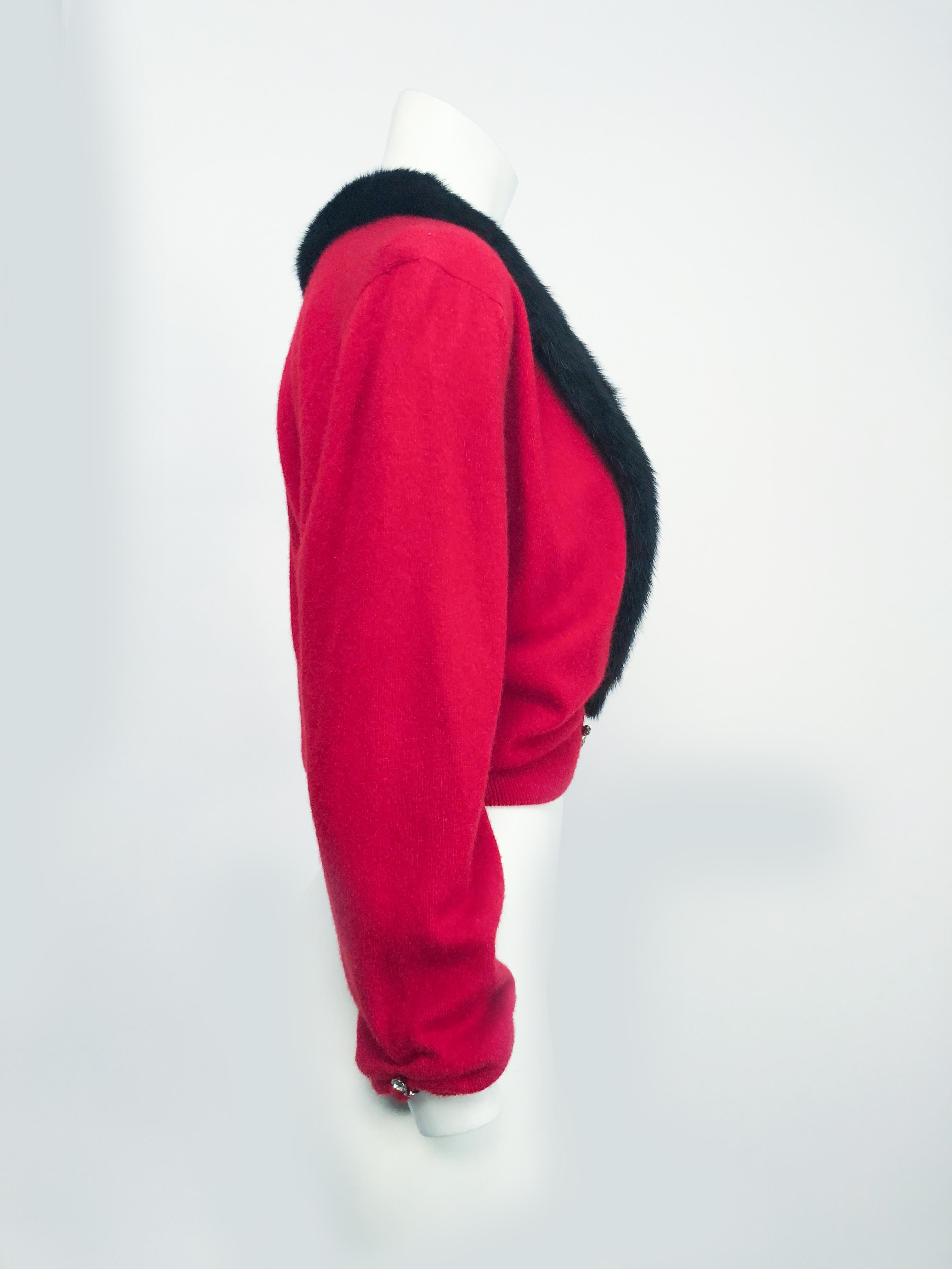 1950s Beth Fritz Red Cashmere Cardigan. Red Cashmere cardigan with rhinestone clasp, roused cuffs, rhinestone buttons, and a dark brown/black mink collar. Lined in Silk chiffon.