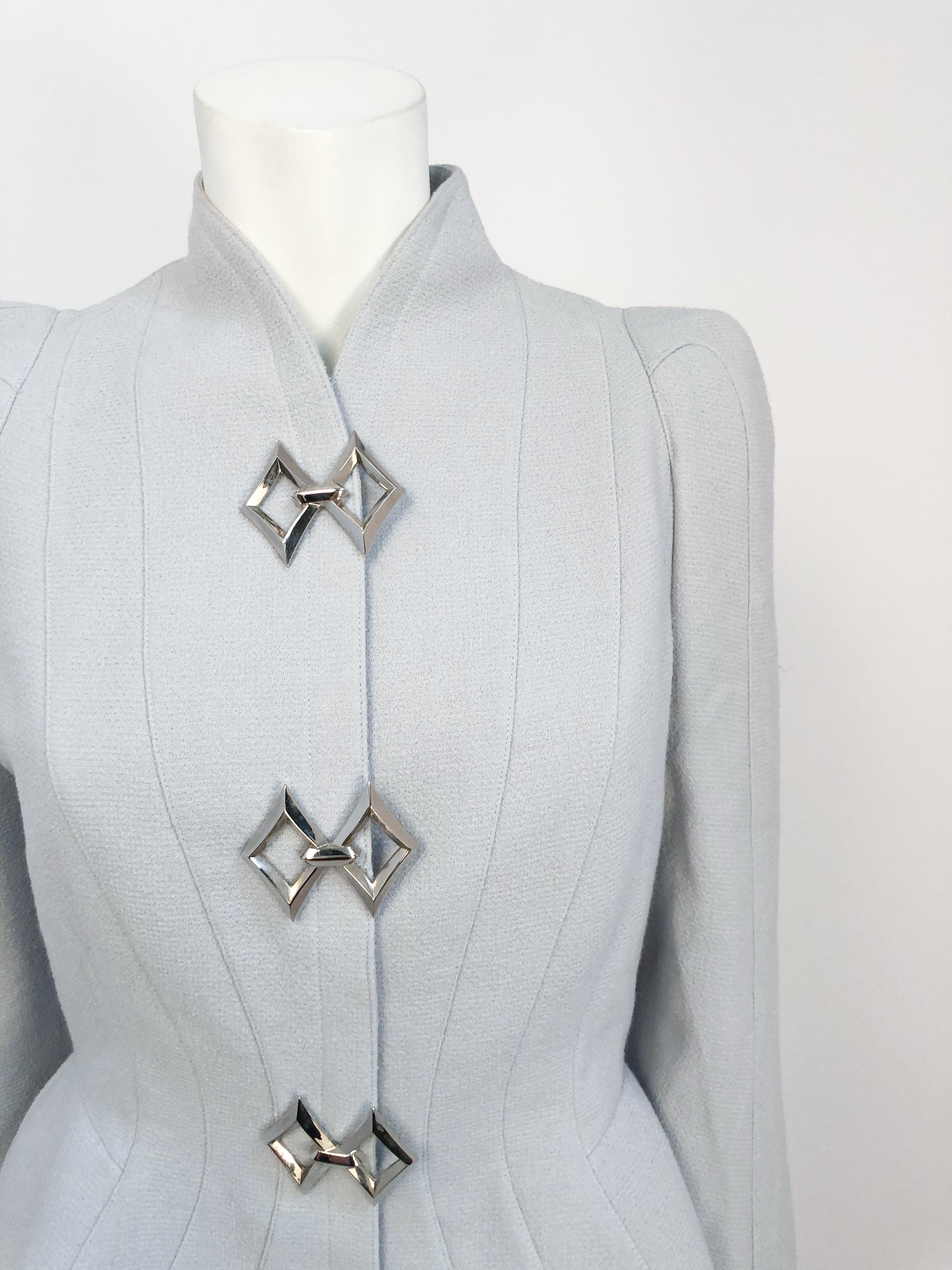 1980s Theirry Mugler Grey Paneled Jacket with Silver-toned Adornments. Also features oversized cuffs, ribbed paneling, and a modest flare at the hip
