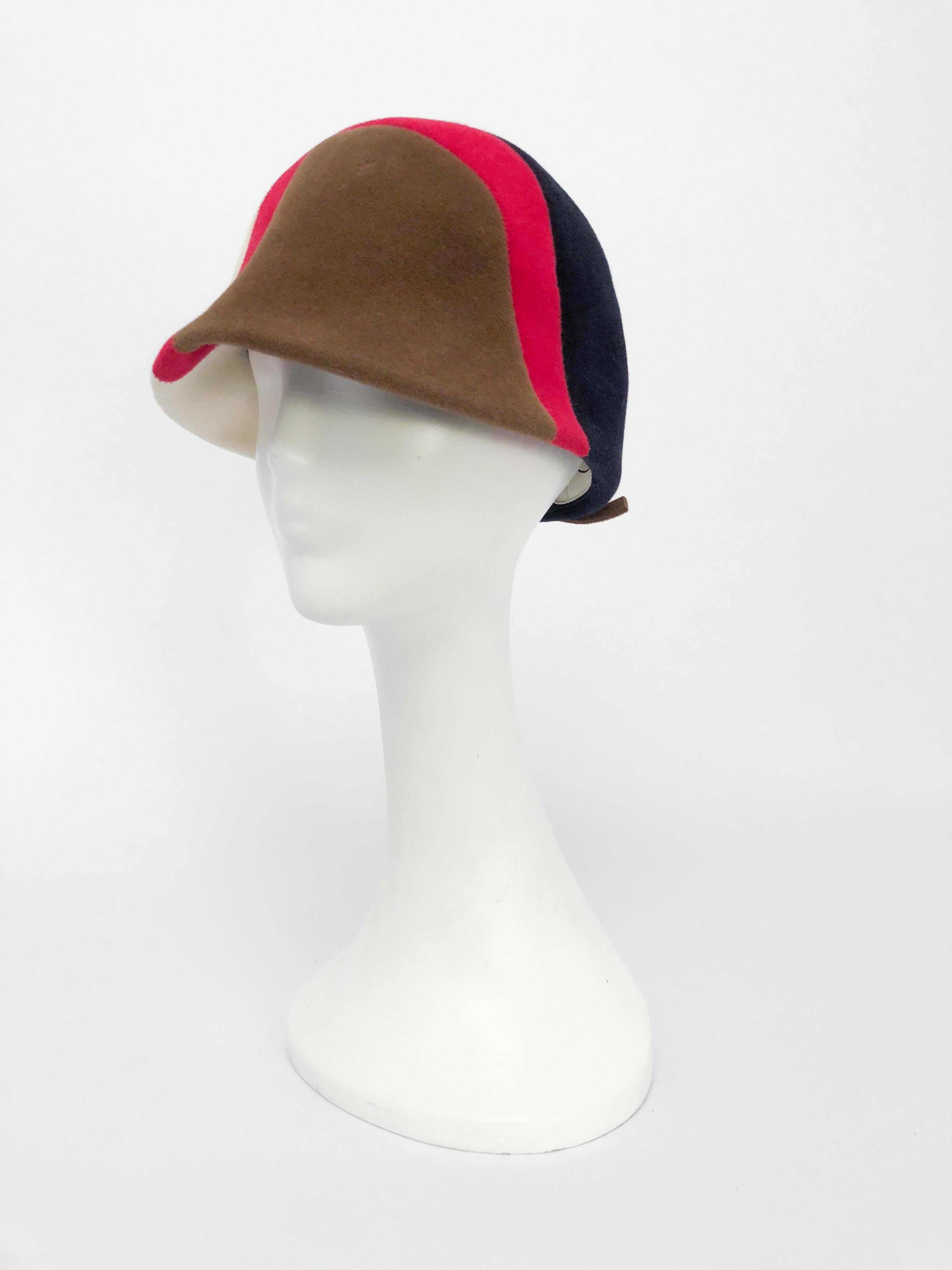 1960s Caroline Mod Hat With Geometric Pattern. Mod hat with Navy, raspberry, cream, and taupe color wave.  