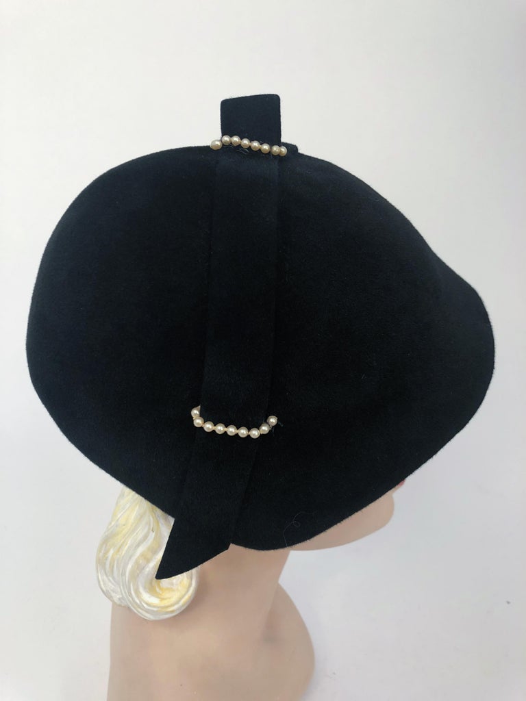 1930s Black Fur Felt Hat With Decorative Ribbon and Pearl Extensions. Black cashmere fur felt hat with decorative handmade felt ribbon, with 3 decorative pearl fastener extentions