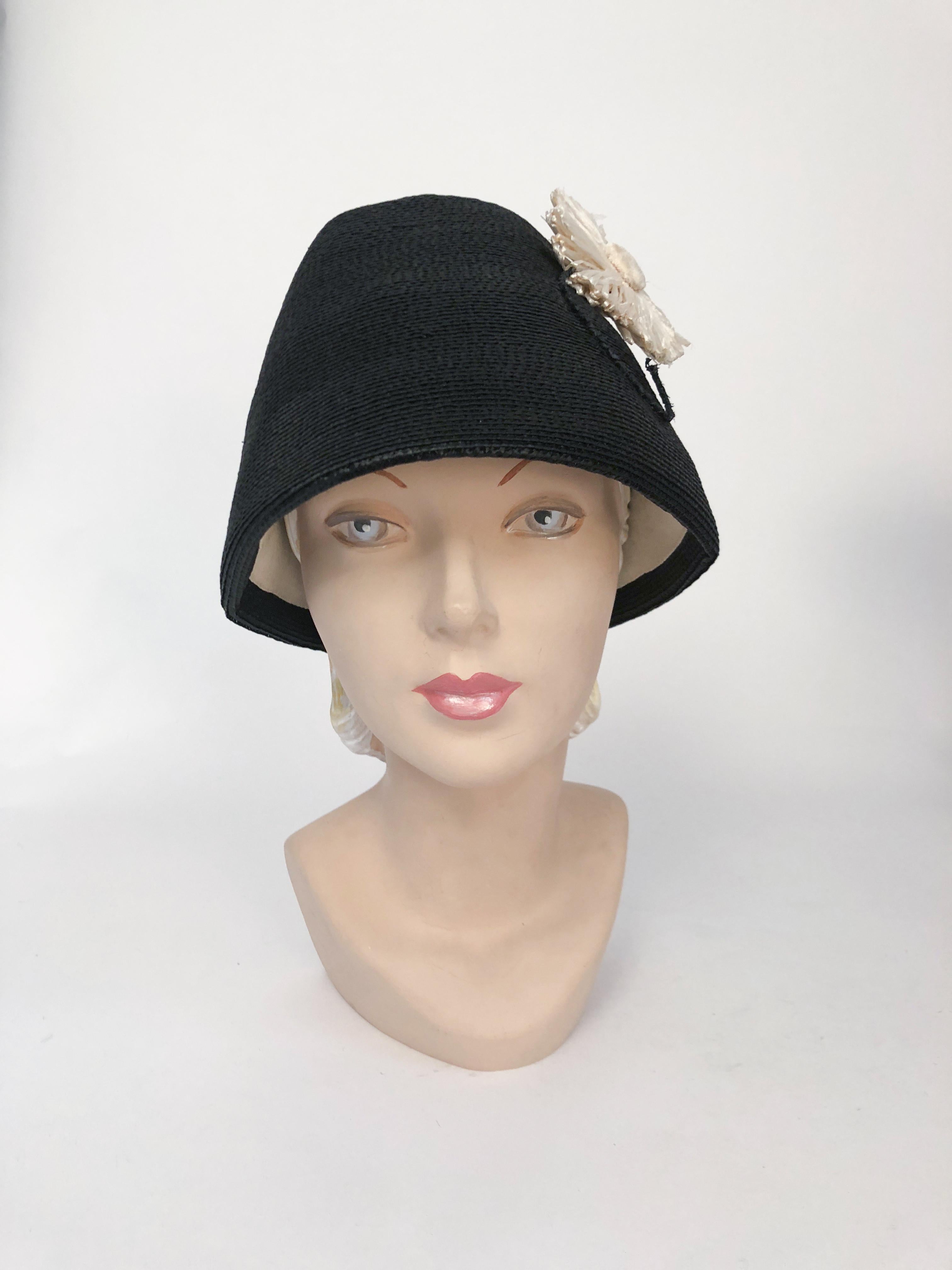 1960s Black Woven Straw Cloche Hat with Decorative Whimsical Daisy accent that is reversible to have multiple positions