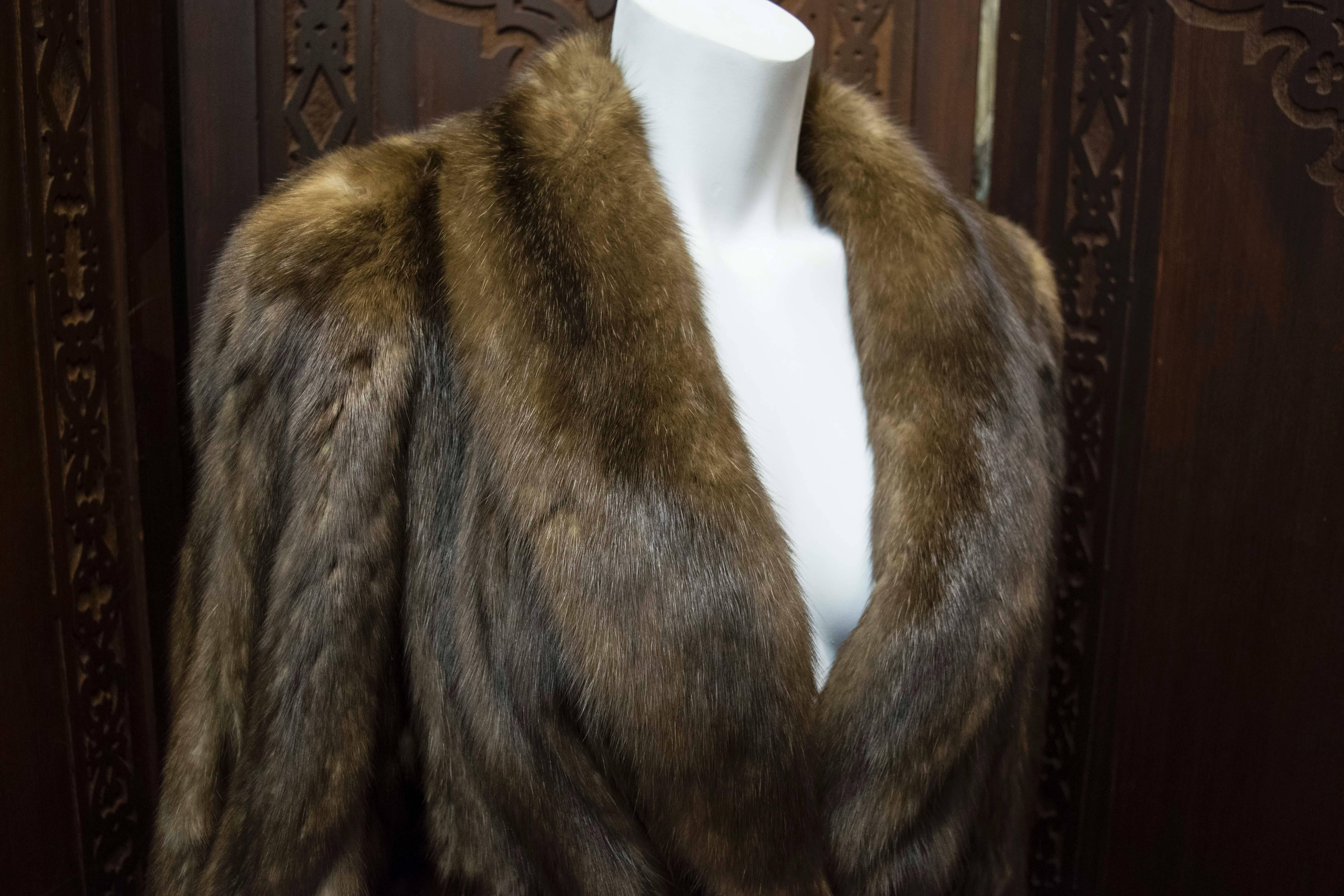 Karl Lagerfeld Sable Fur Coat. 
Stunning Sable fur coat designed by Karl Lagerfeld in the 1980s. Has a beautiful scalloped edge and wonderful silky fur. Styled with belt, which can be purchased separately. Slight glazing on the shoulders. 

B 40