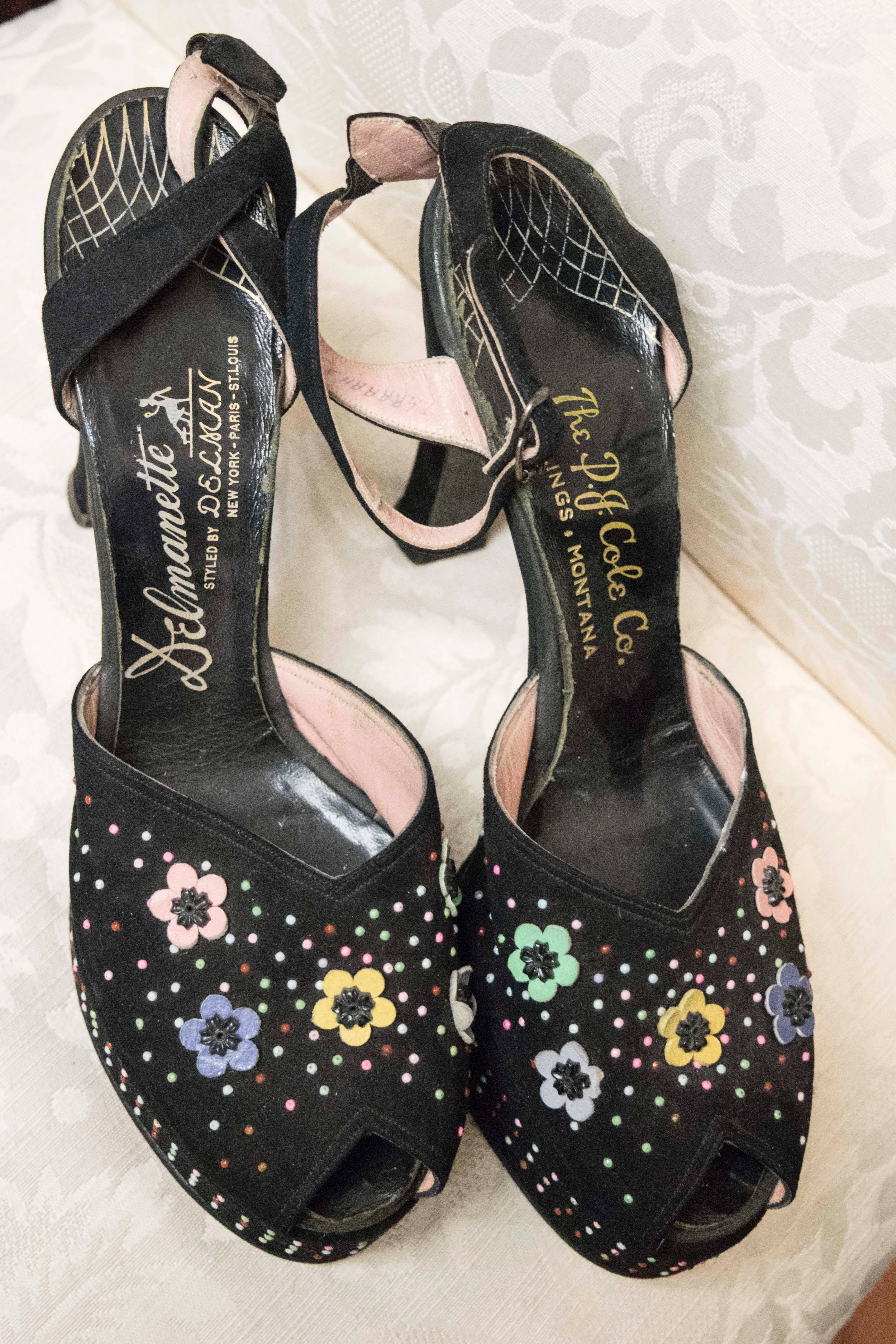 1940s Beaded Platform Shoes.

Beautiful cotton candy studded suede platform shoes. There are charming leather flowers details over the peep toe. They have an ankle strap and a leather soul. They are a great size, and are completely wearable.