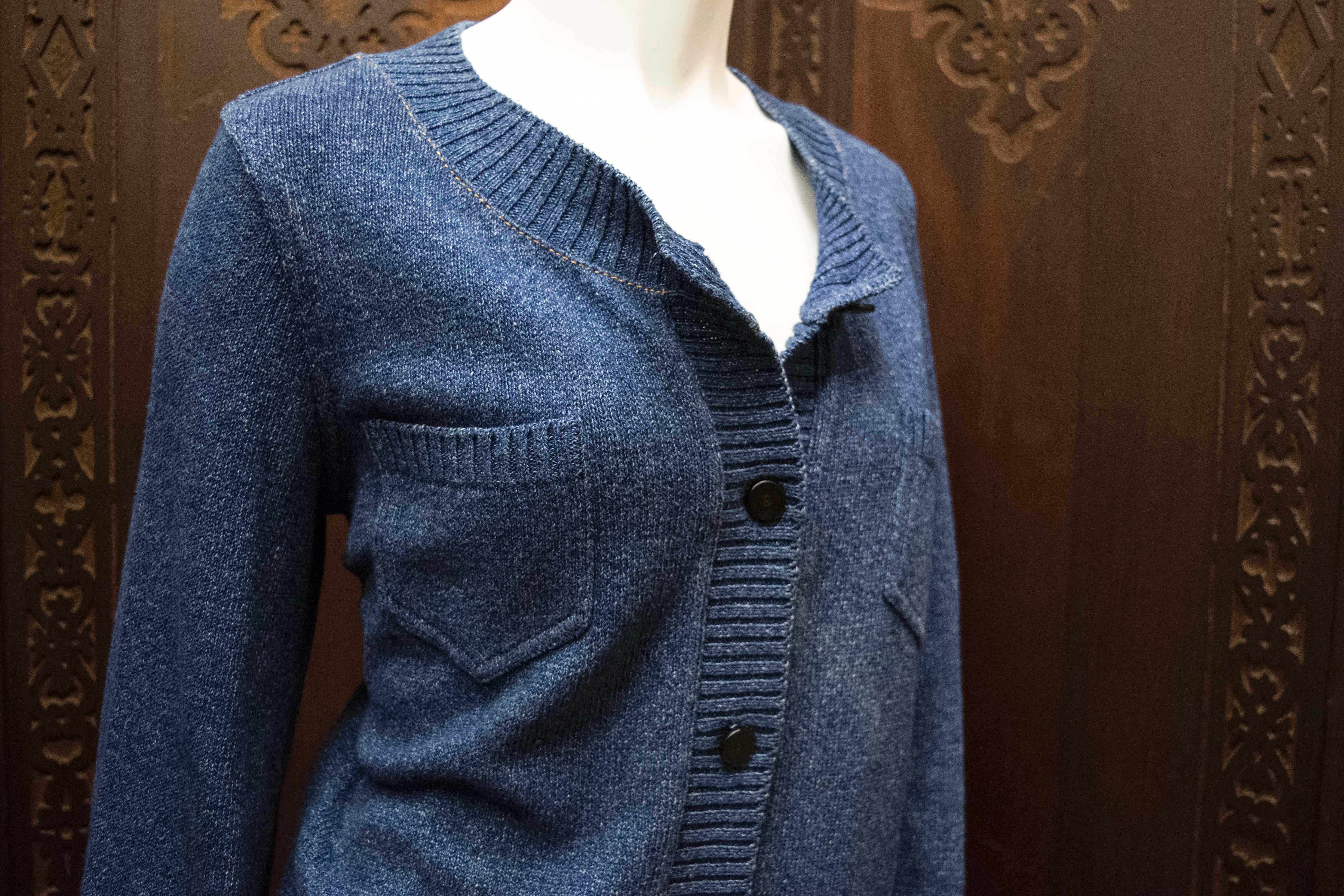 90s Chanel Blue Knit Cardigan 

Sublime Chanel cardigan, from the Winter collection and is a fantastic staple item for fall. Measuring

Bust: 40 inches
Hemline of cardigan: 42 inches
Sleeve Length (measured from top of shoulder seam to wrist):