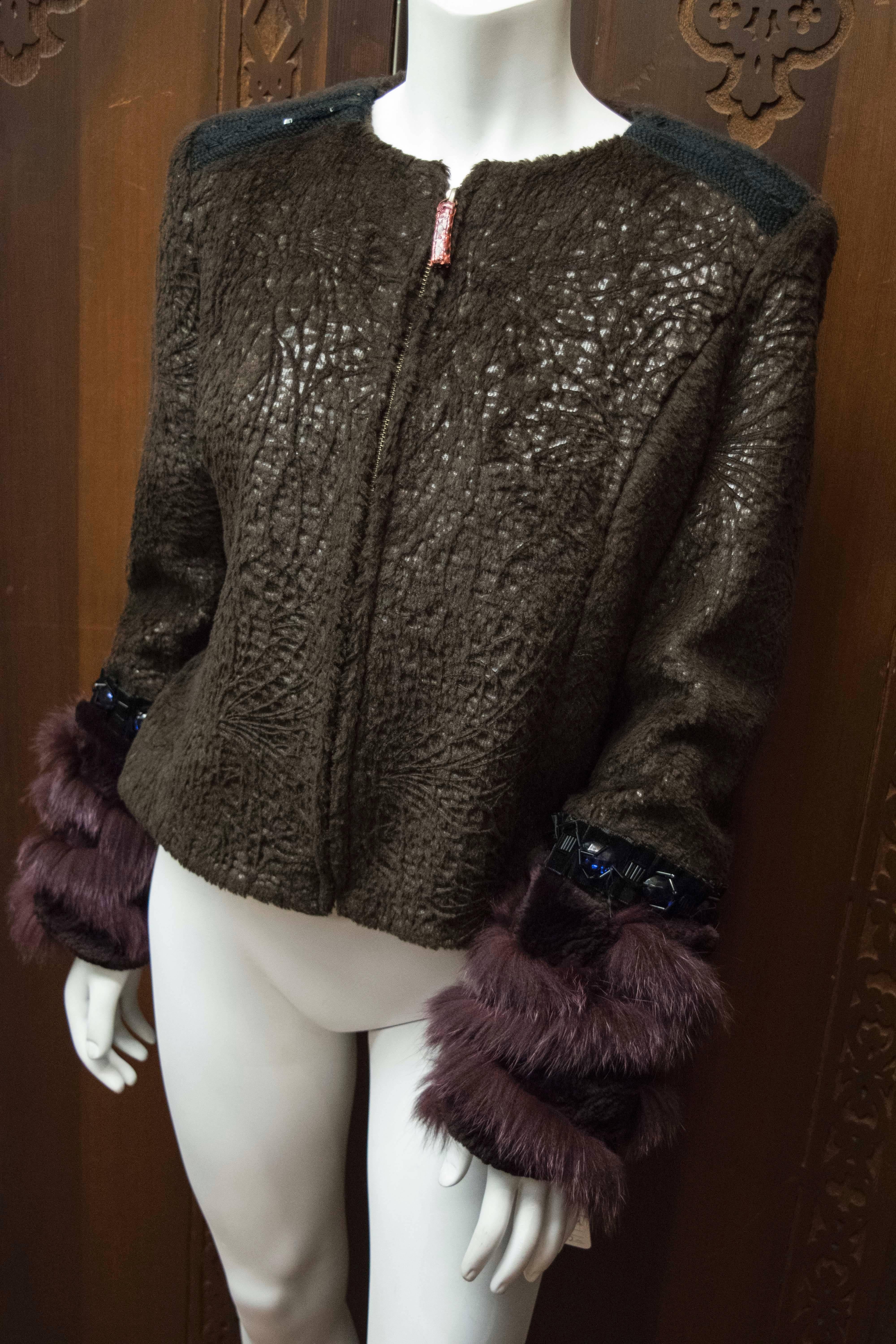 1990s Christian Lacroix Jacket With Fox Fur Trim

An interesting piece designed by Lacroix in the '90s, the jacket boast dyed Fox and sheered Beaver sleeve details as well as bejewelled epaulettes.

Size 42

B 40
W 34
H 36
L 22