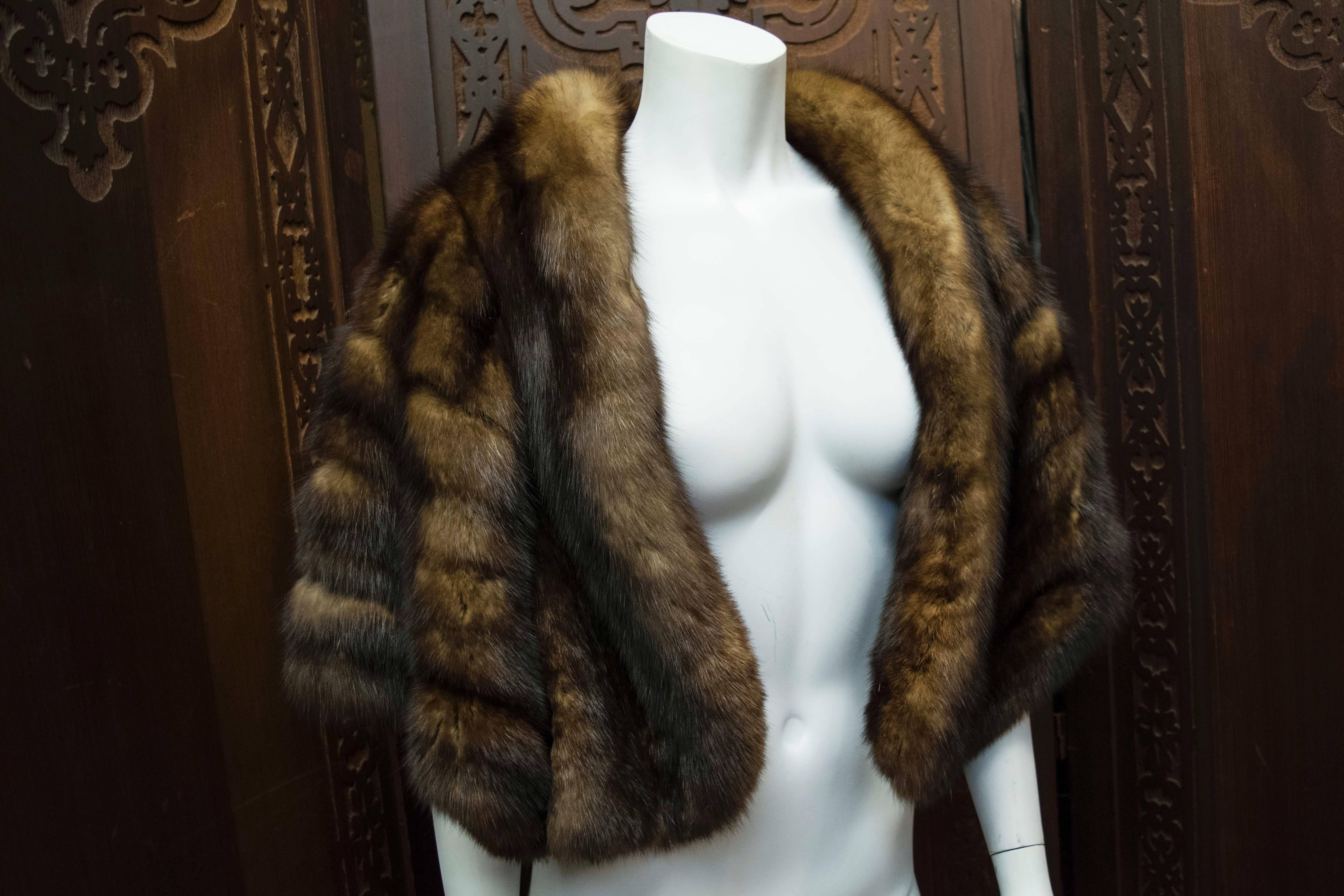 1950s Sable Fur Wrap

Gorgeous soft and rare Sable fur wrap. Sable fur has been a highly valued item in the fur trade since the early Middle Ages, and is generally considered to have the most beautiful and richly tinted pelt among martens. Sable