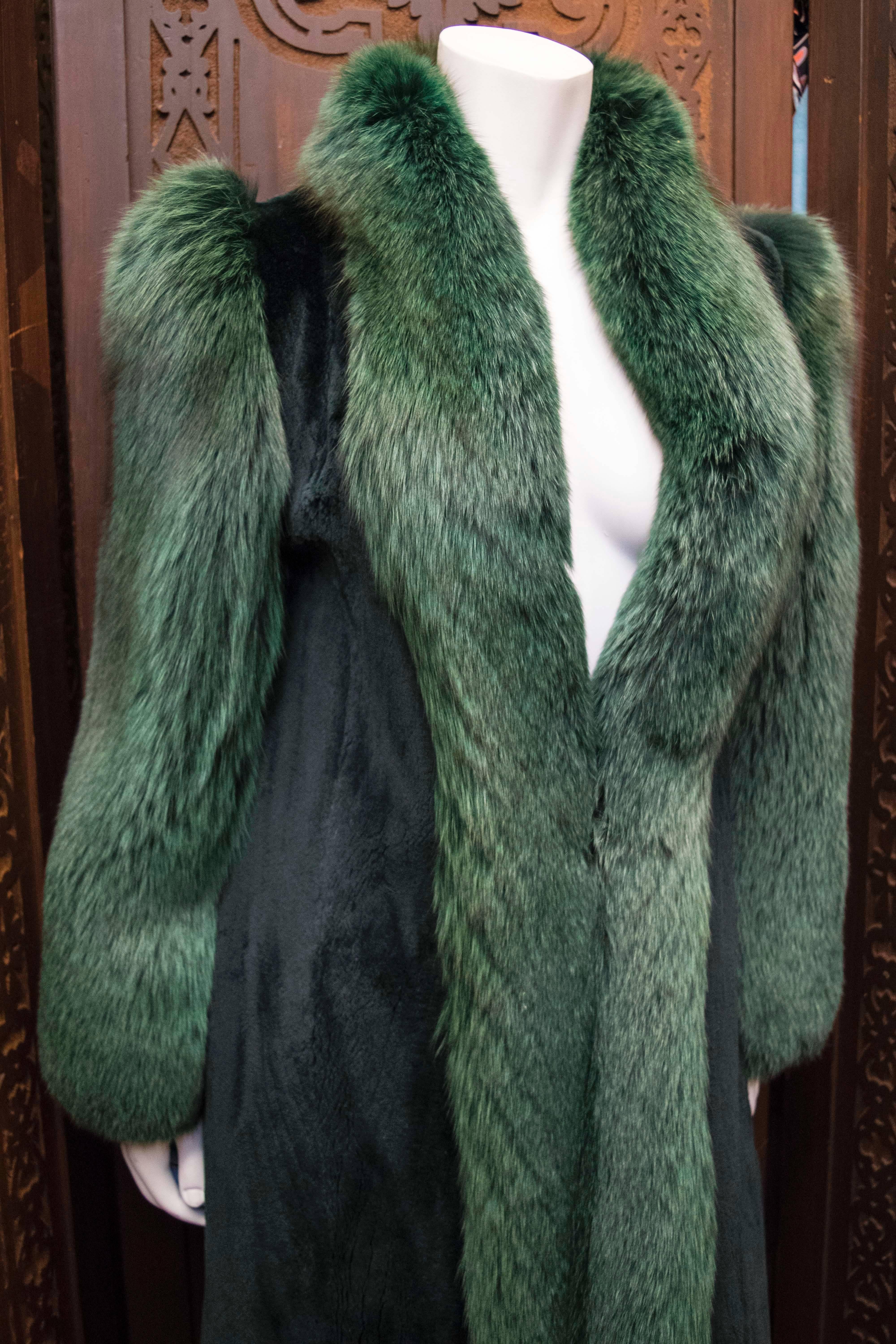 1980s Saks Fifth Avenue Green Fox and Sheered Mink Fur Coat

Opulent dyed green sheered mink with dyed green fox fur sleeves and collar. A similar coat was produced in the Gucci AW11 collection. 

B 36
H 42
L 46