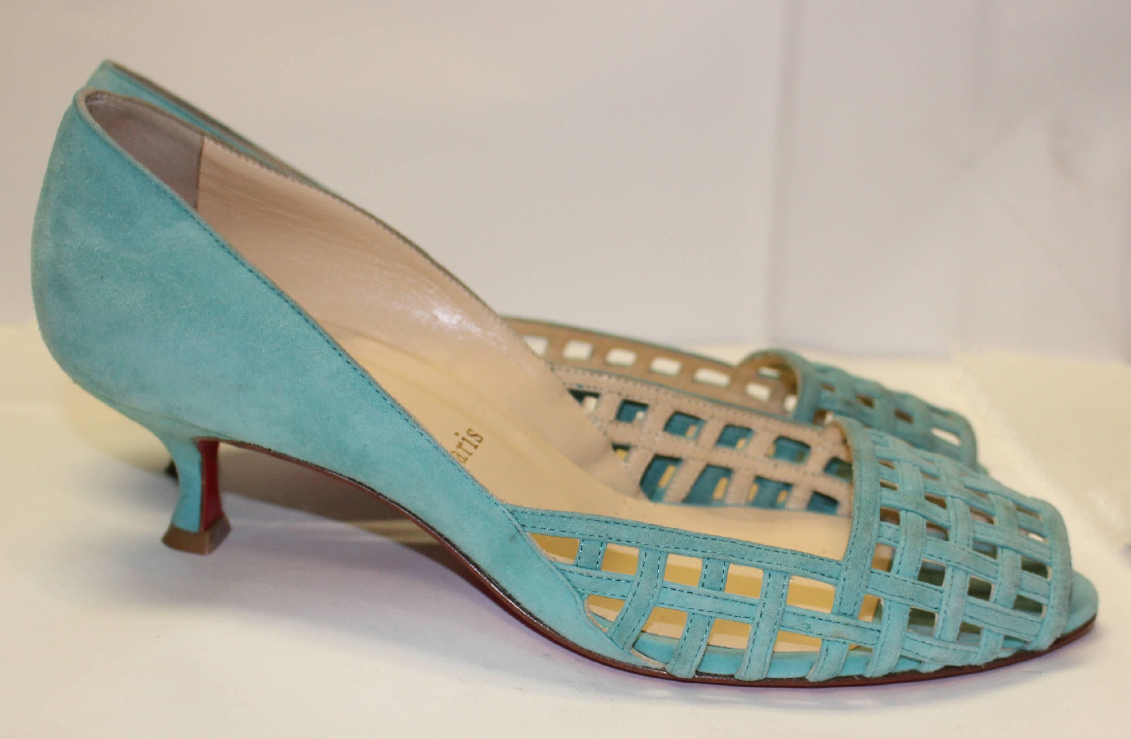 1990's Christian Louboutin Paris suede kitten heels. Sewn birdcage-design upper with peep toe. Made in Italy. Size 39.5. 

Measurements: 
Heel to toe: 10"
Palm of foot: 3 1/4"
Heel: 2" 