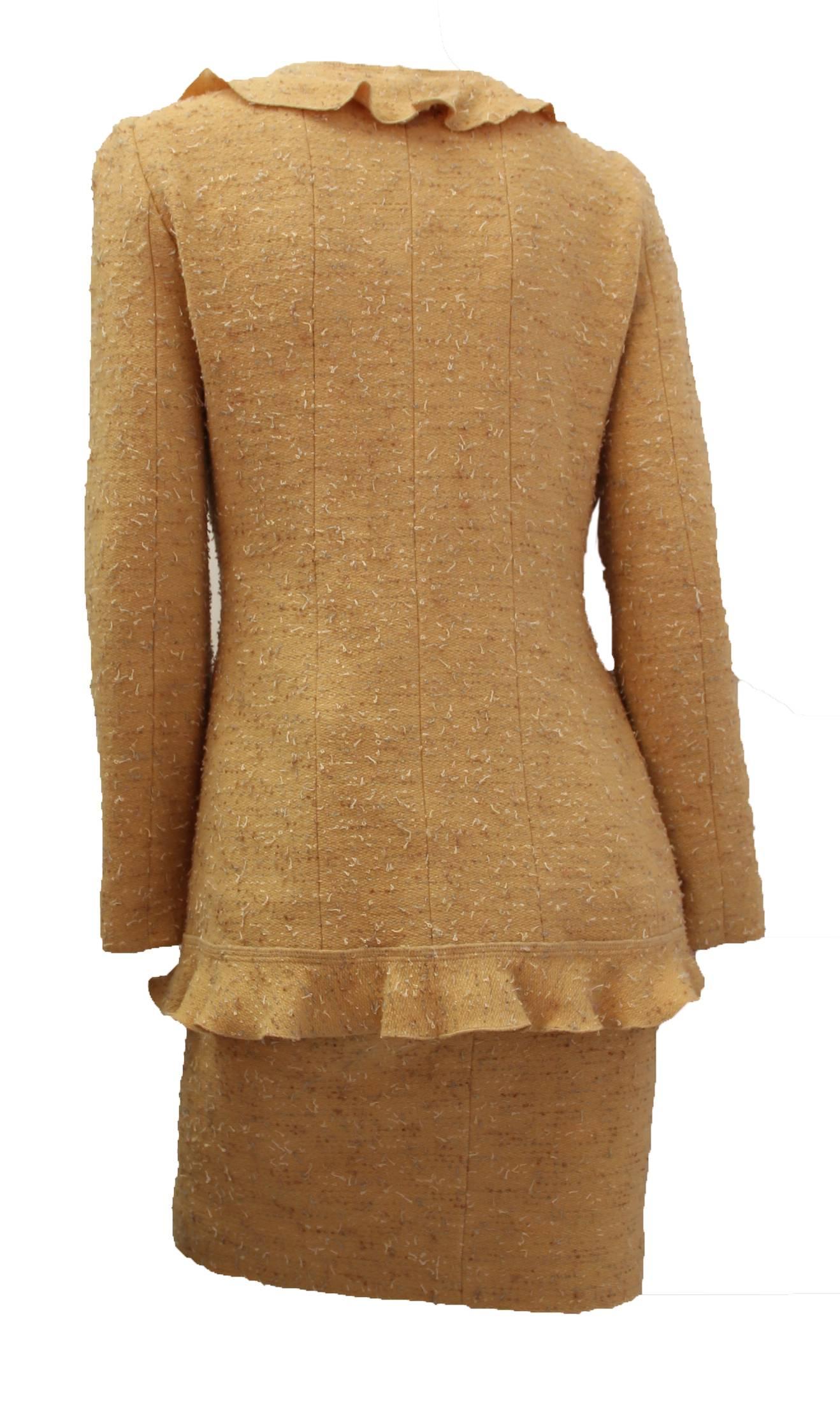 1990s Chanel pale saffron wool tweed suit with fluted trim and silk lining. 

Measurements: 
Jacket
Shoulder: 15