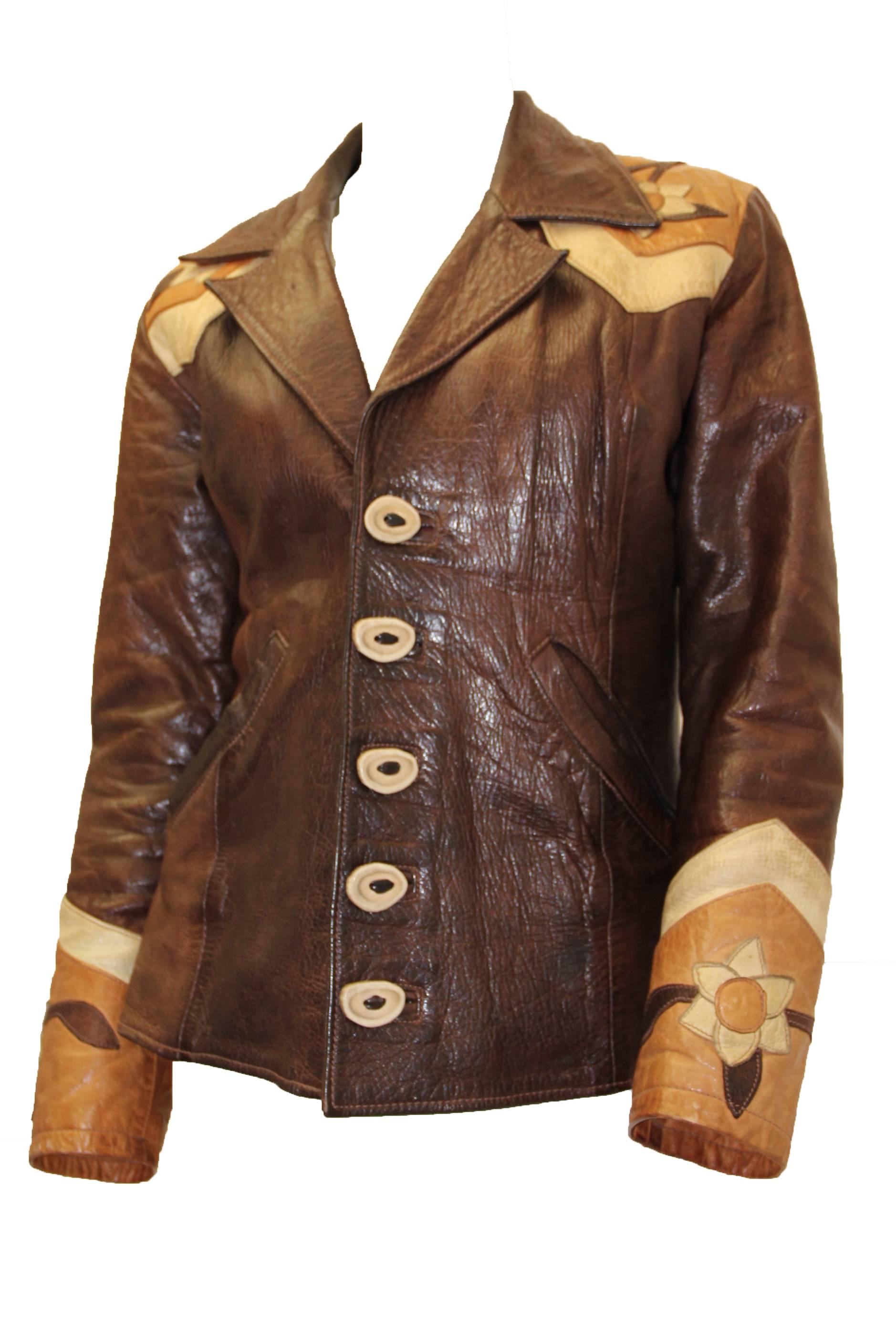 Late 1960s handmade leather jacket. Elk horn buttons. 

Measurements: 
Shoulders: 15