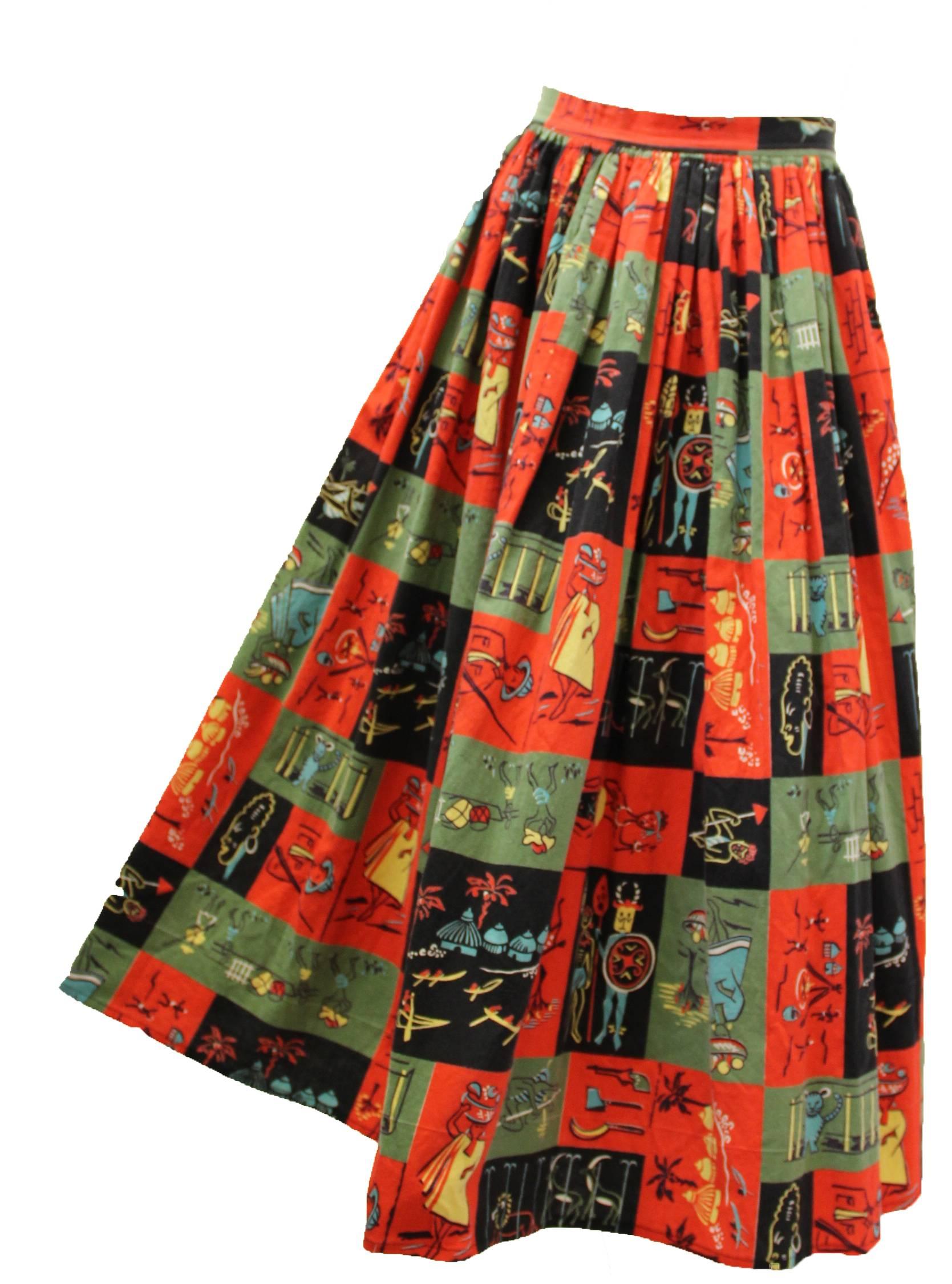 Jungle print 1950s full circle skirt. 100% Cotton. Metal zipper snap closure (as seen in photograph) 

Measurements:
Waist: 24