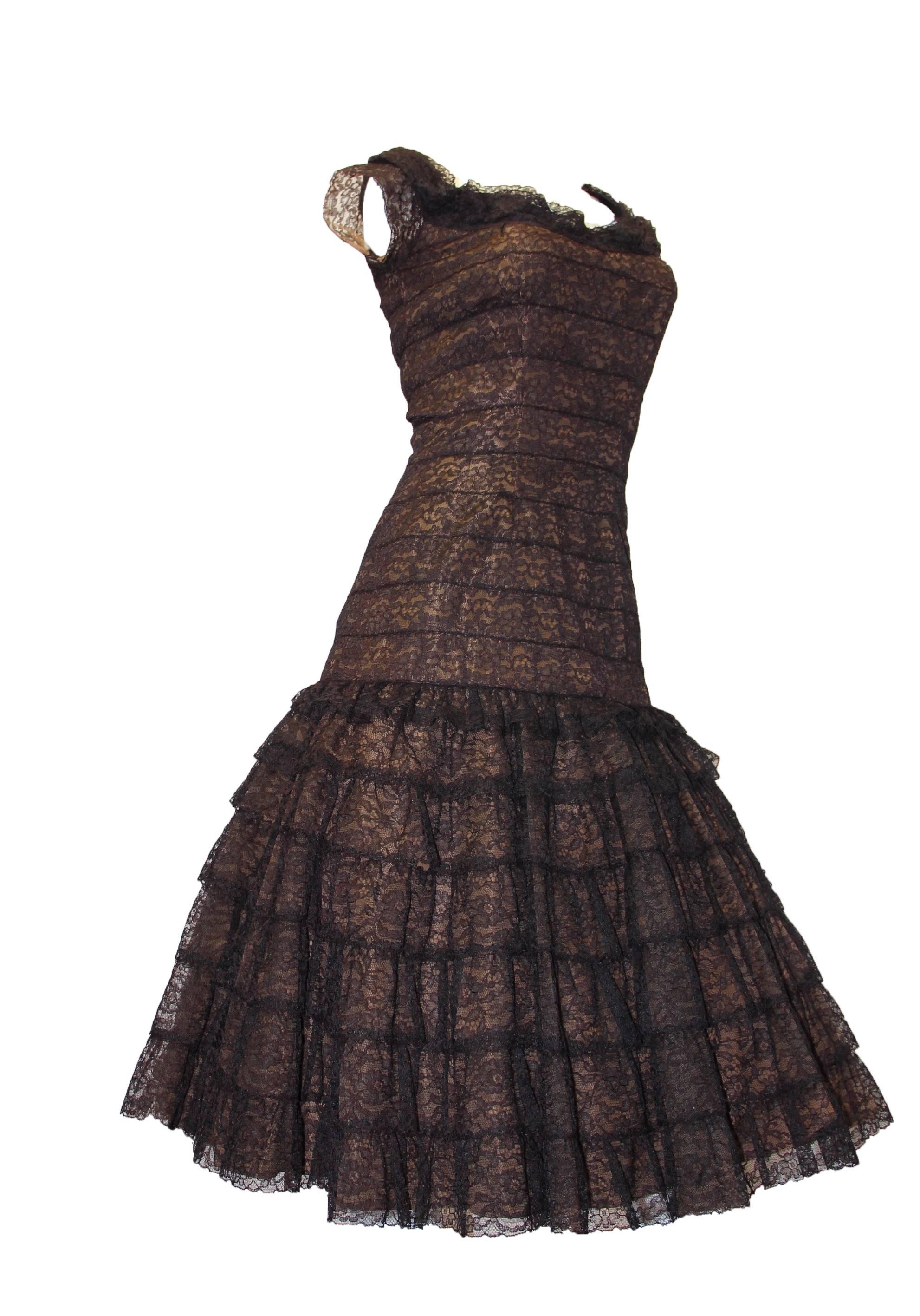 50s drop waist lace tiered skirt with fitted bodice. Slightly off shoulder. Chocolate brown lace, mocha colored lining. 

Bust: 34-36 inches
Waist: 26 inches
Hip: up to 39 inches
Length: 44 inches