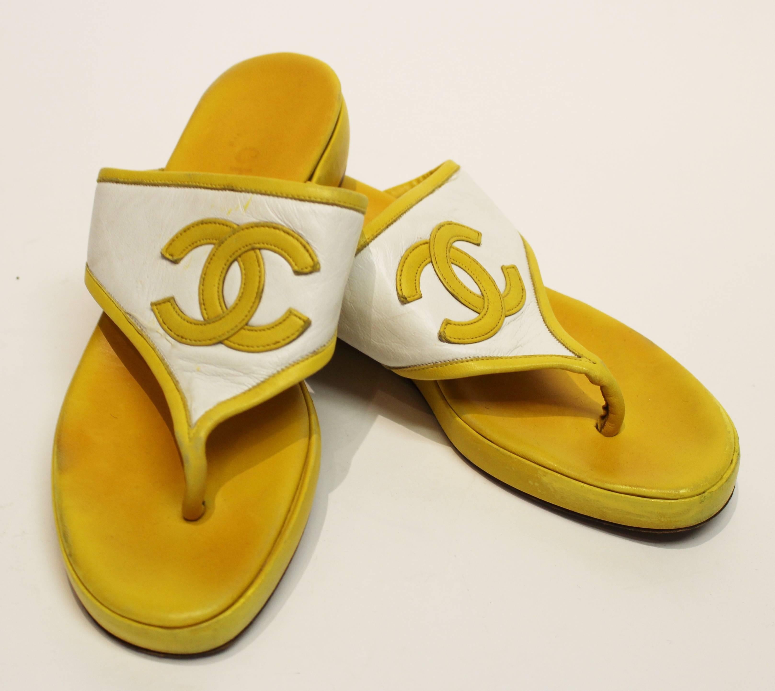 80s Chanel leather yellow and white thong sandals. Leather soles. 

Measurements

Length: 9 1/4