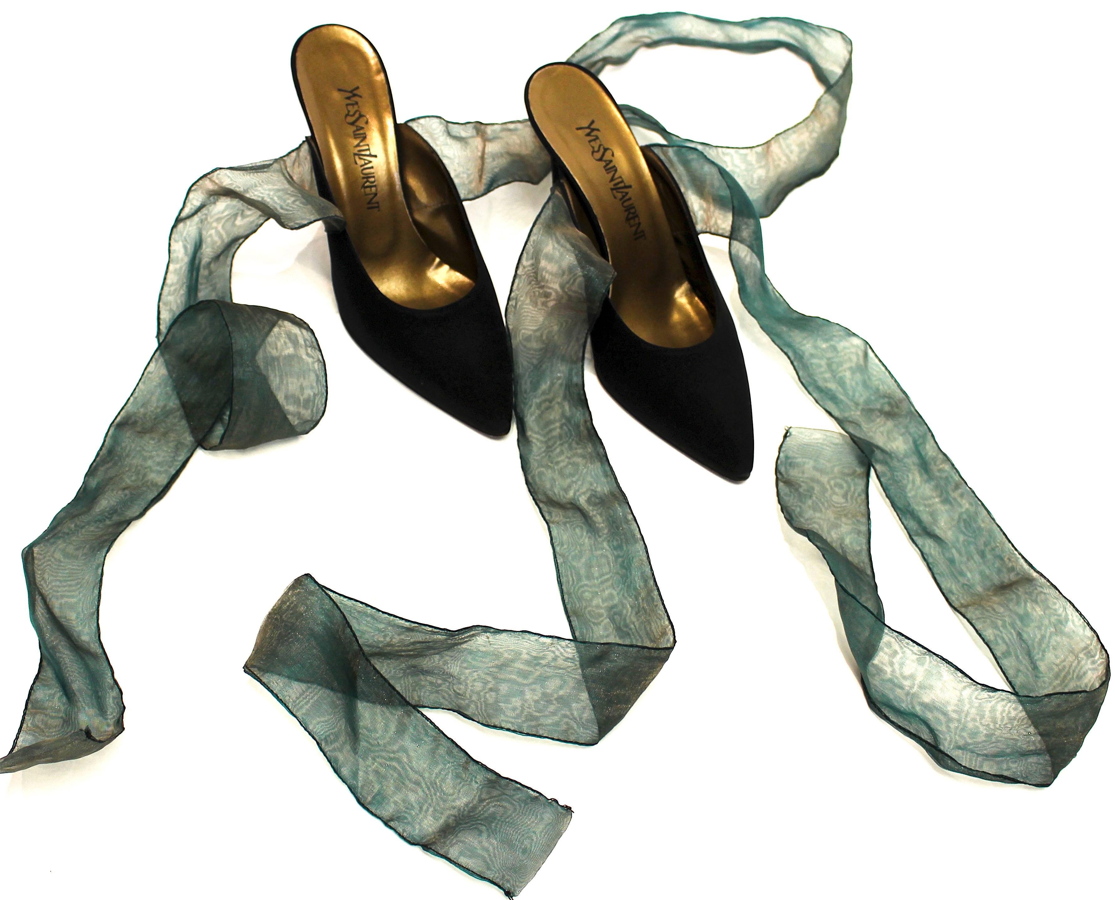 70s Yves Saint Laurent mules with iridescent green ribbon ties. 

Measurements:
Insole: 10