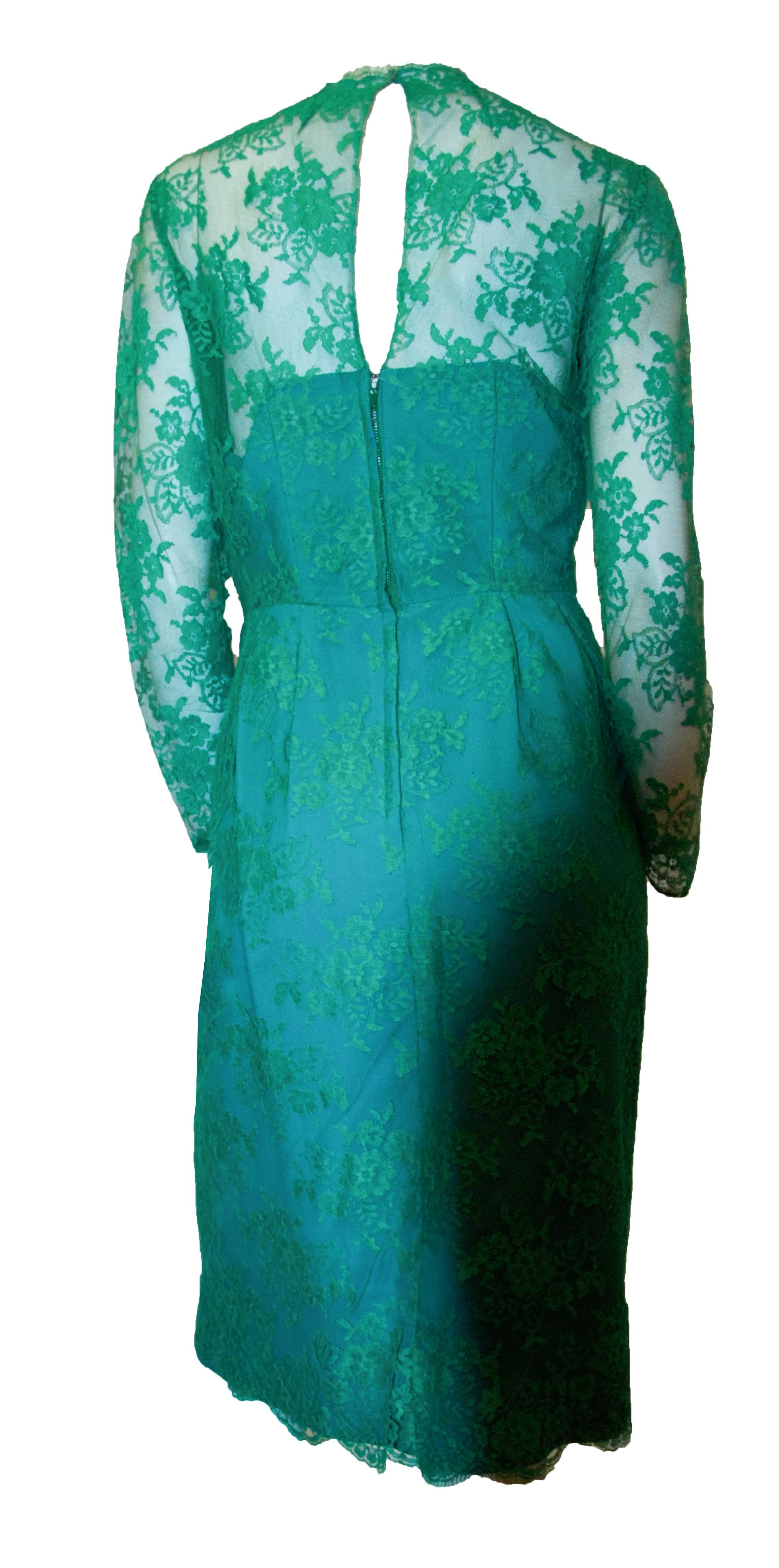 60s green lace illusion cocktail dress with long sleeves. Metal zipper. 