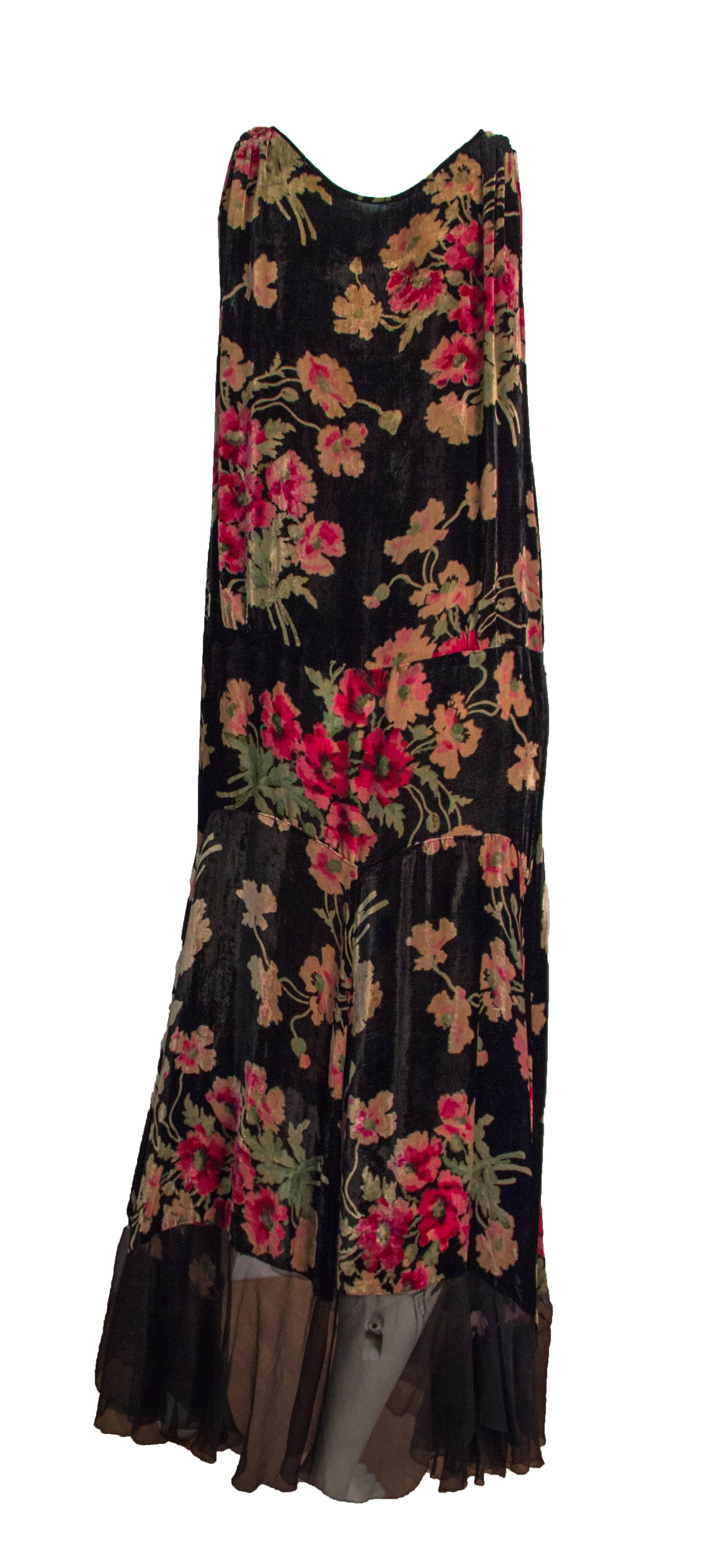 20s velvet floral printed drop waist dress with beaded embellishment along bust line. Chiffon trim along hemline. Unlined 